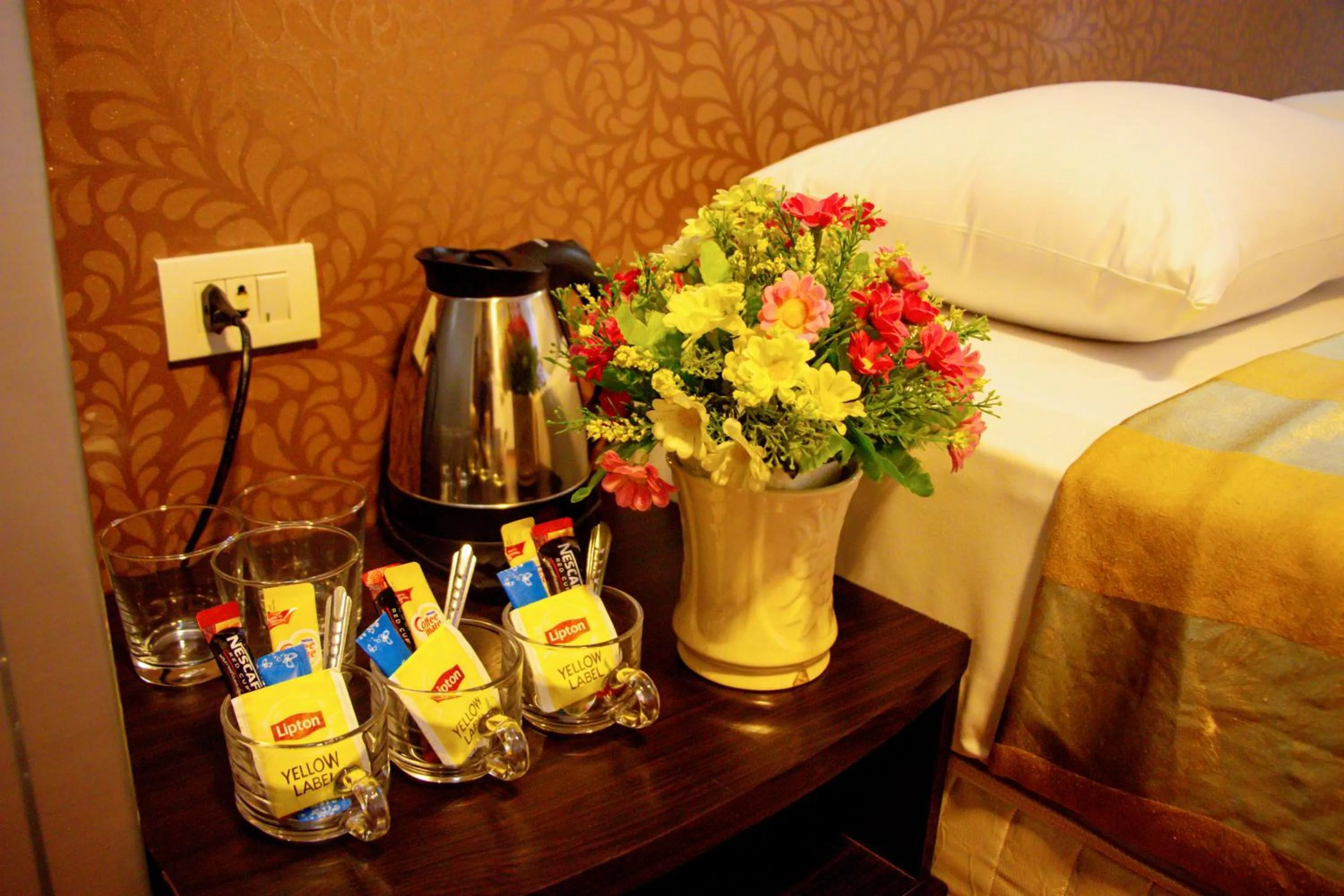 Bed in Visiting Card Hotel & Resort