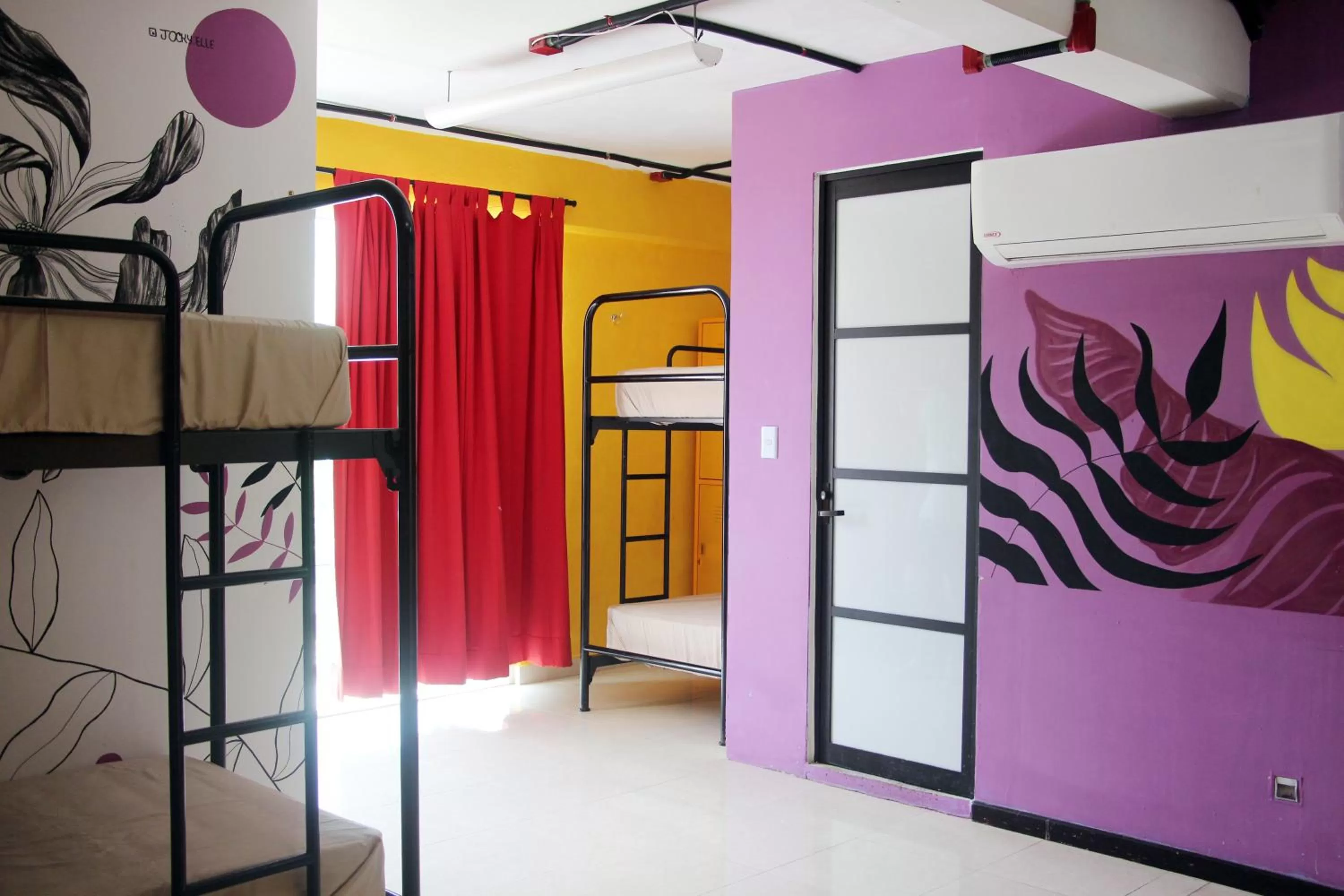 Photo of the whole room, Bunk Bed in Hotel & Hostal Casa de Luz Cancun