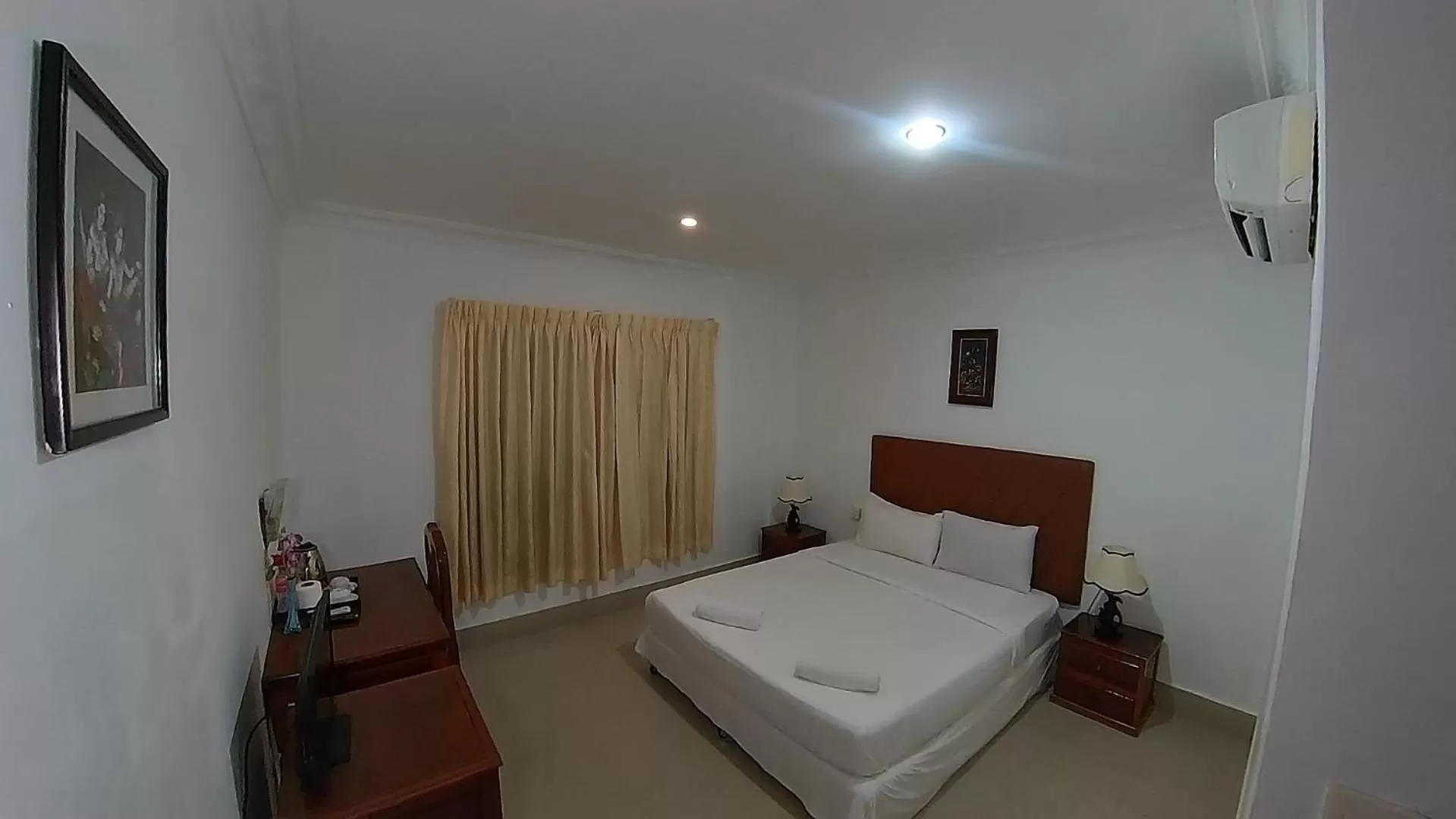 Bed in Riverside Hotel Phnom Penh