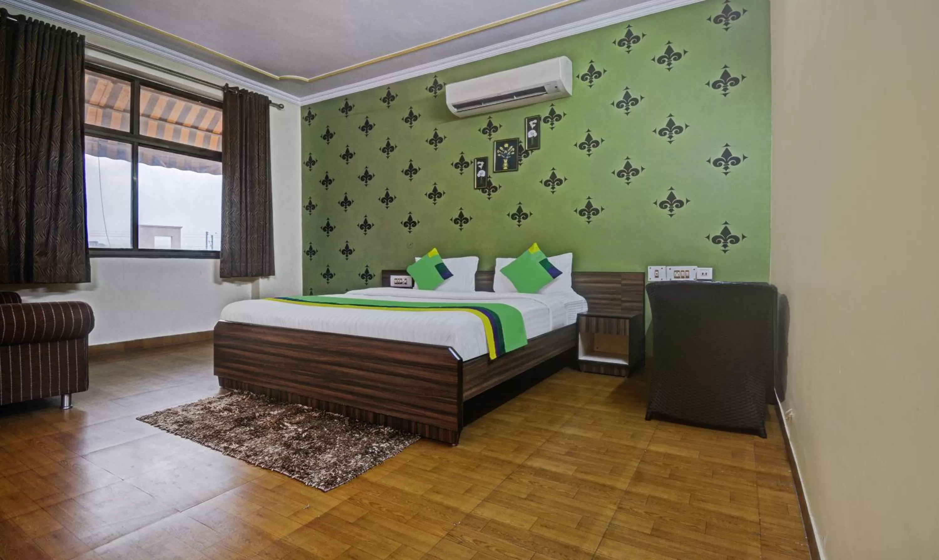 Bedroom, Bed in Treebo New Rockwell Vivek Vihar