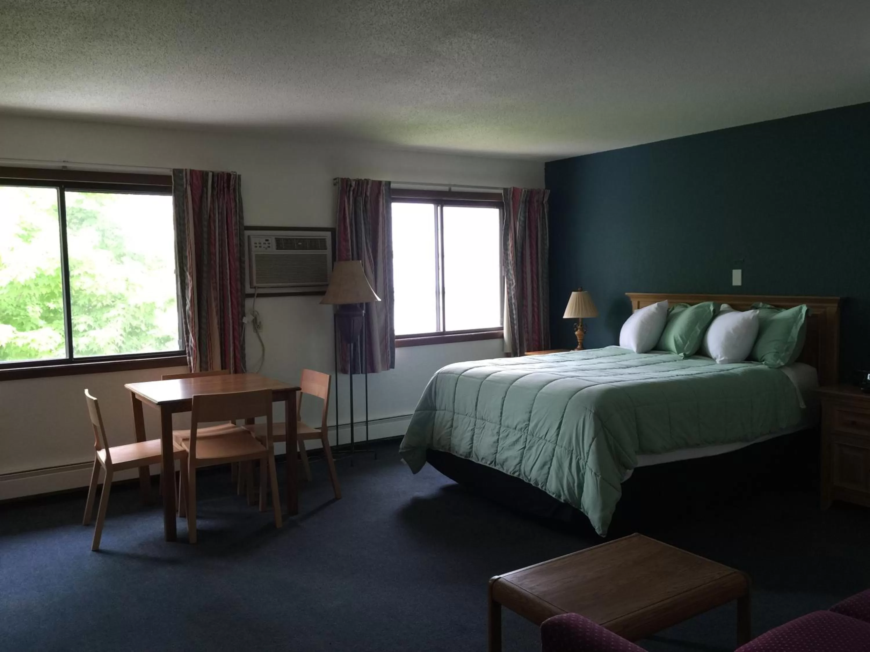 Bed in AmericInn Motel - Monticello