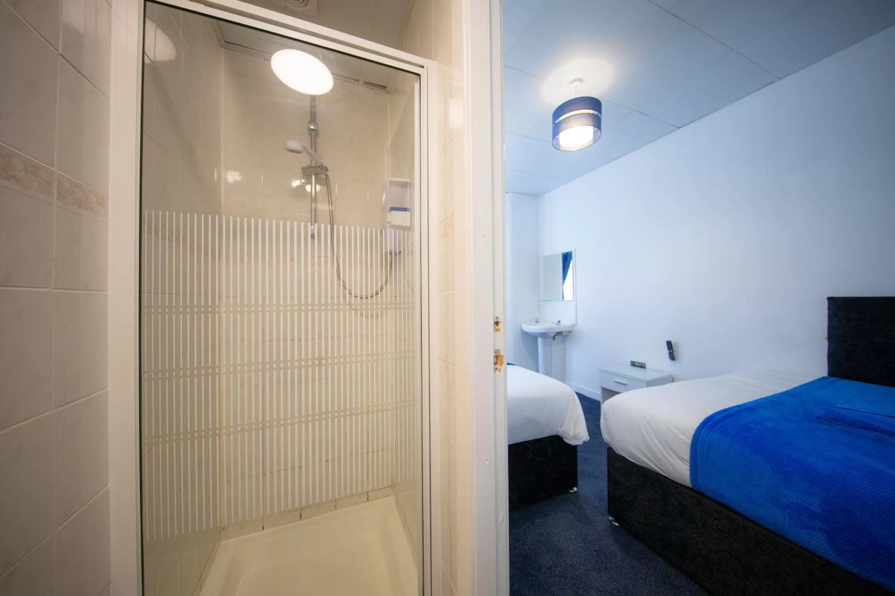 Bed in The Adonis Hotel