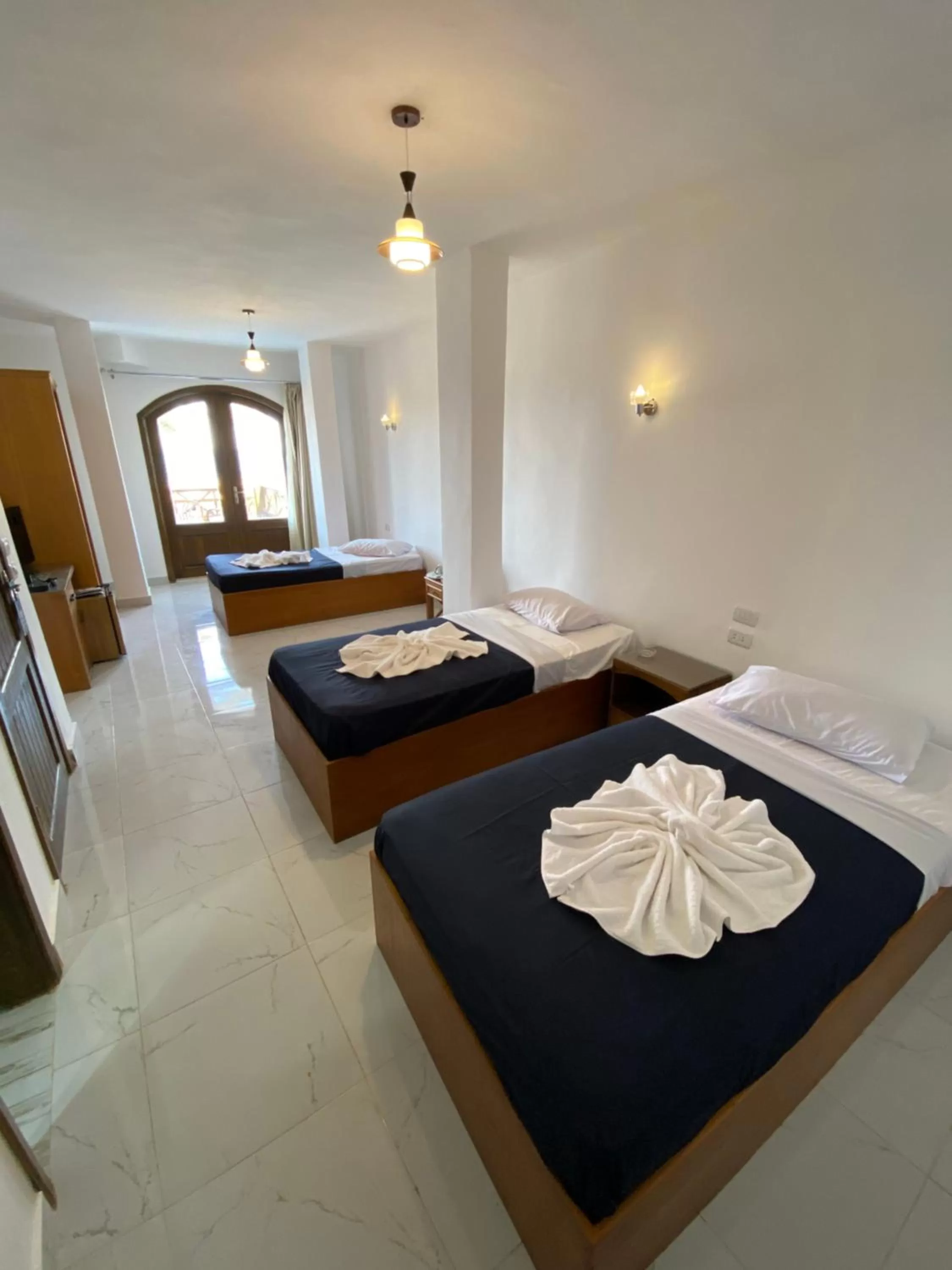 Photo of the whole room, Bed in Penguin Village Dahab