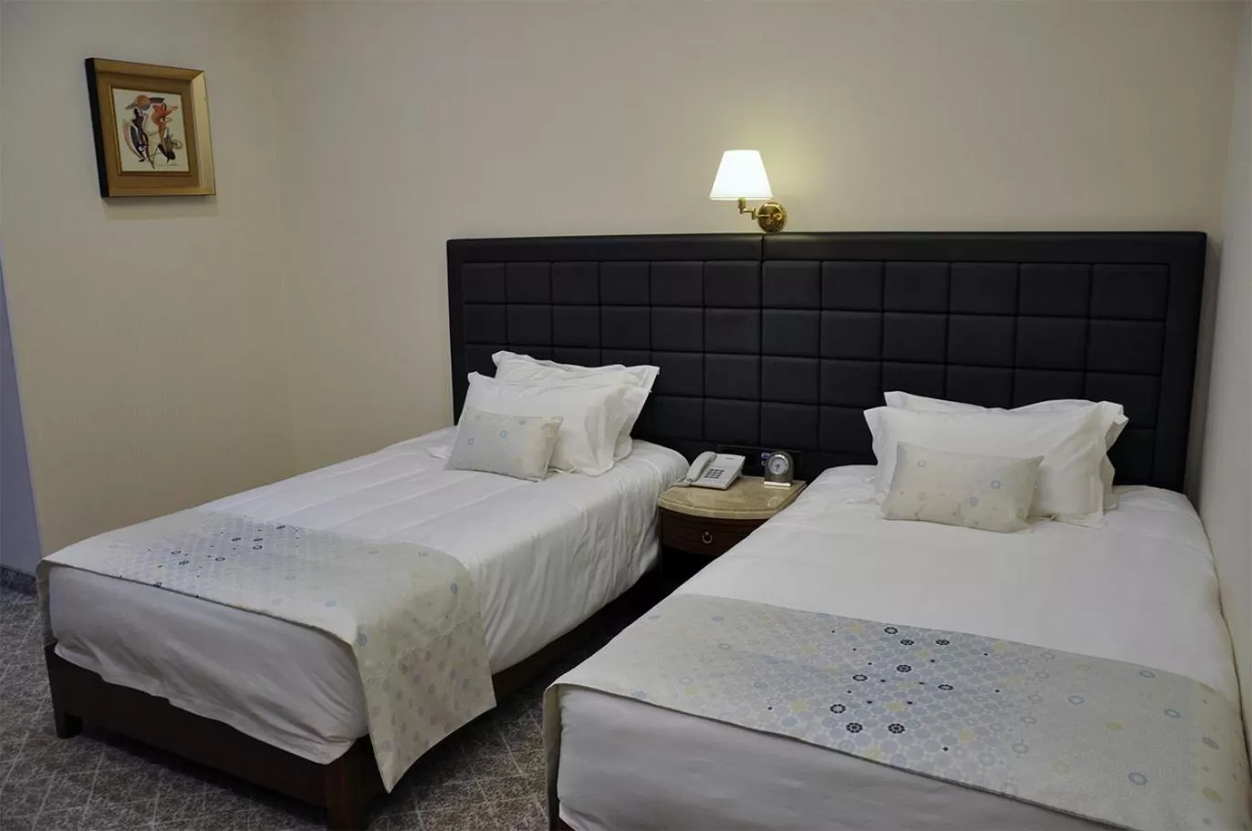 Bed in Parliament Palace Hotel