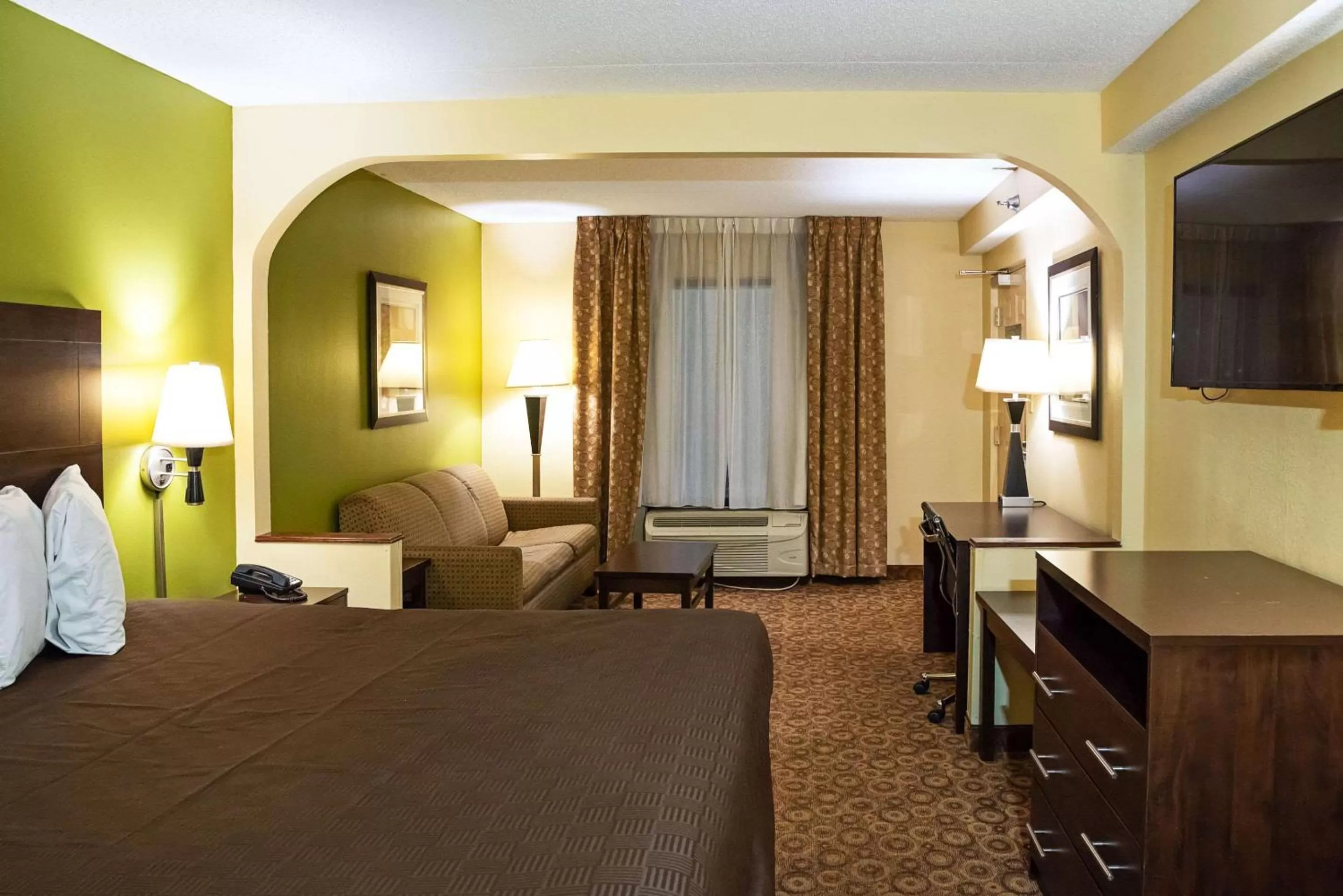 Photo of the whole room, Bed in Rodeway Inn & Suites Clarksville near Governors Square Mall