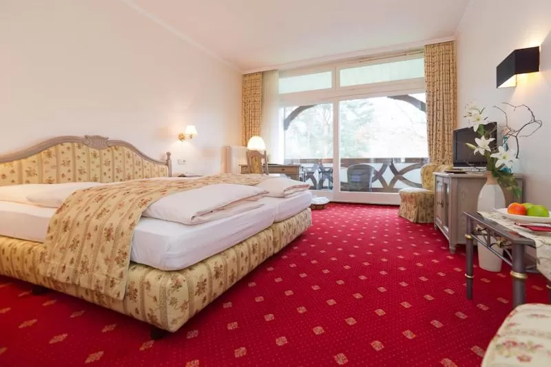 Photo of the whole room, Bed in Hotel Aselager Mühle