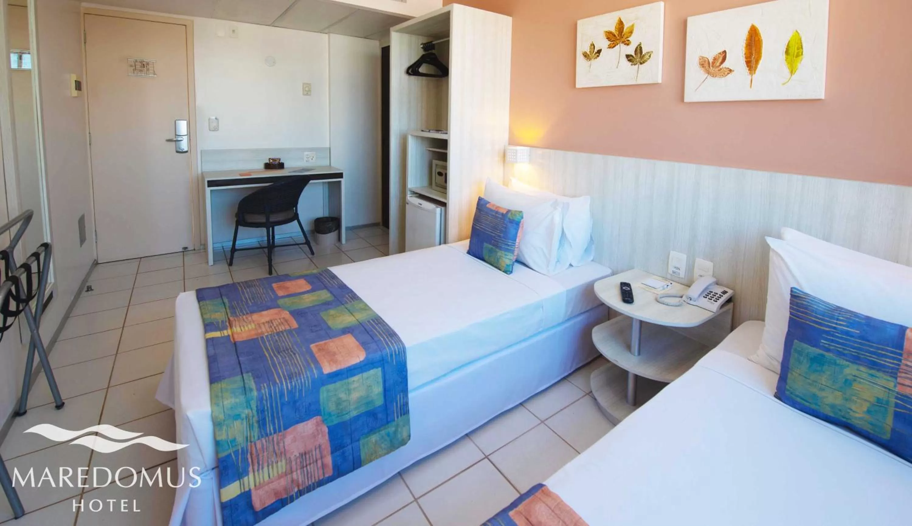 Bed in Maredomus Hotel