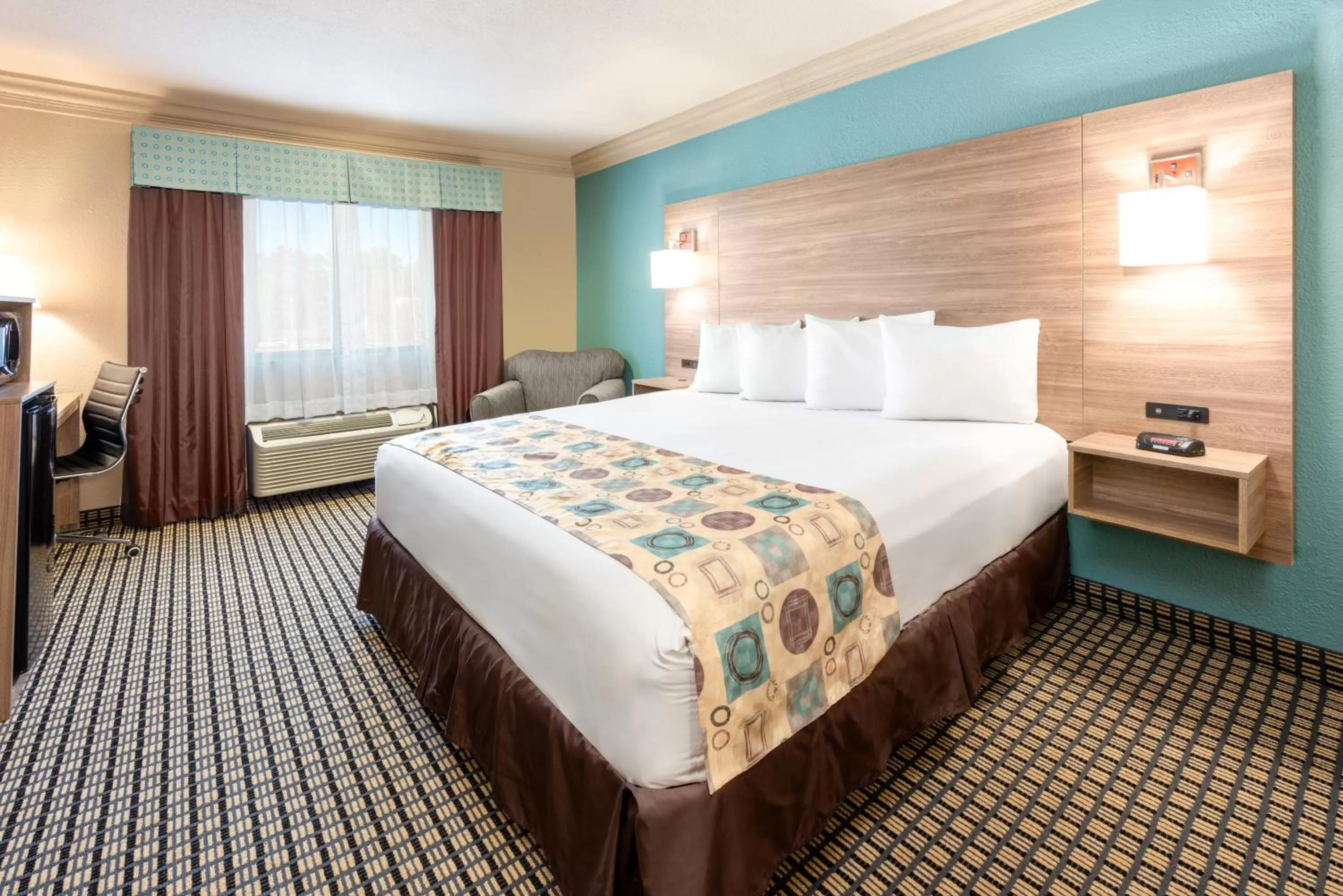 Photo of the whole room, Bed in Ramada by Wyndham Houston Intercontinental Airport South