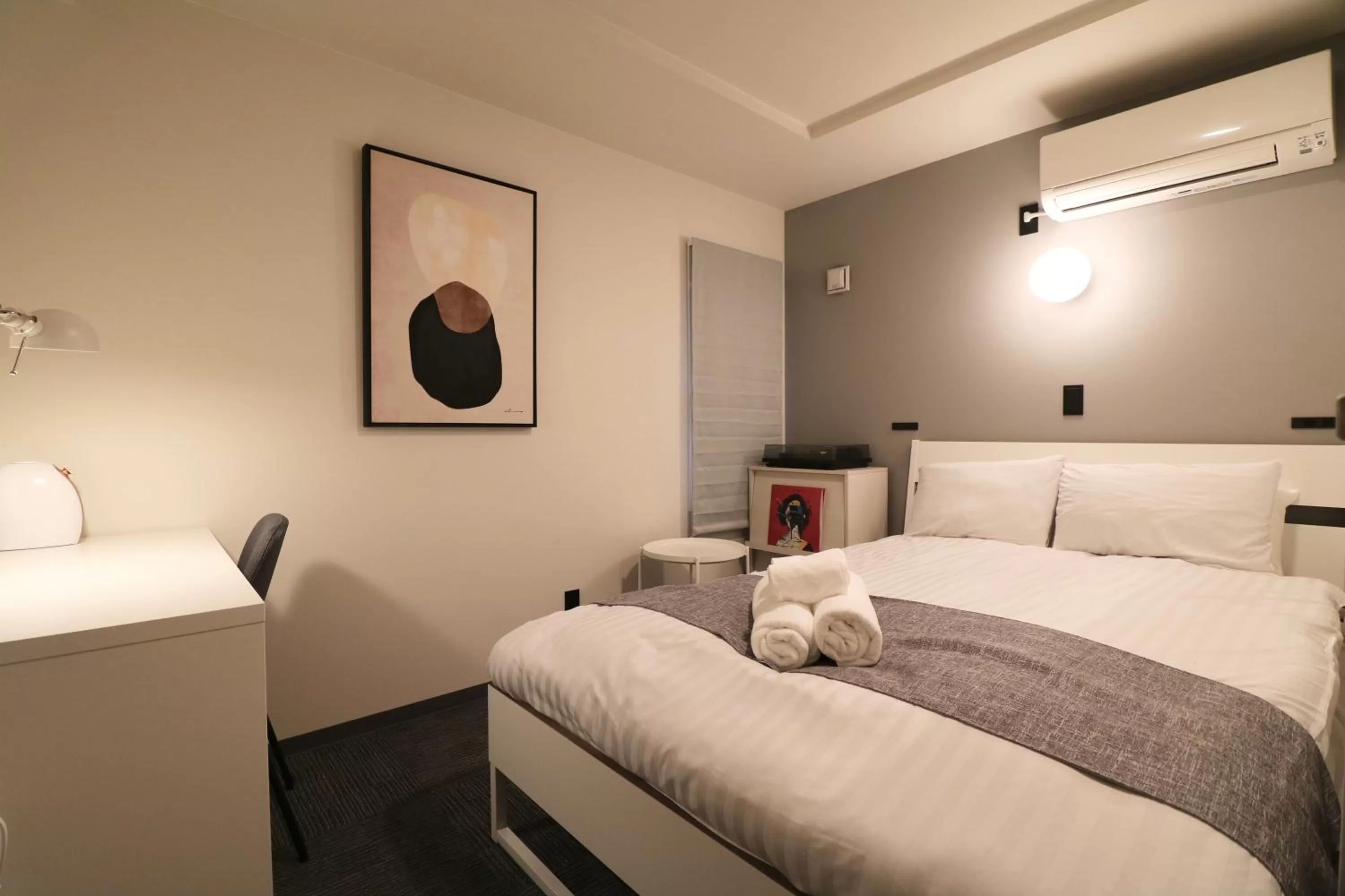 Bed in TAKETO STAY PREMIERE SAPPORO Eki