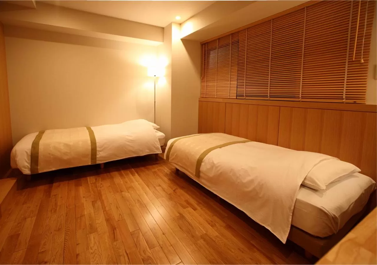 Bed in Sutton Place Hotel Ueno