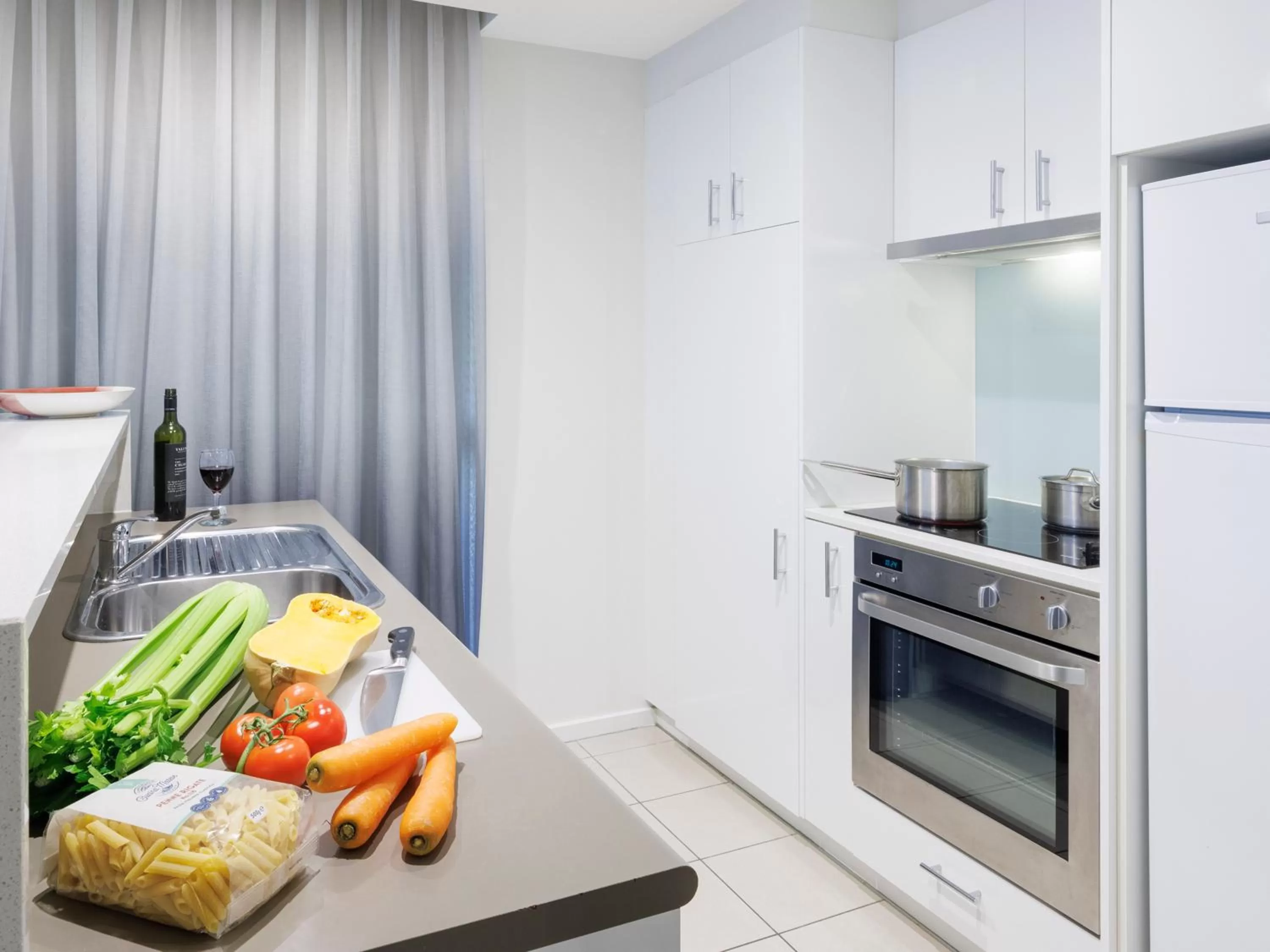 Kitchen or kitchenette in Brady Apartment Hotel Flinders Street