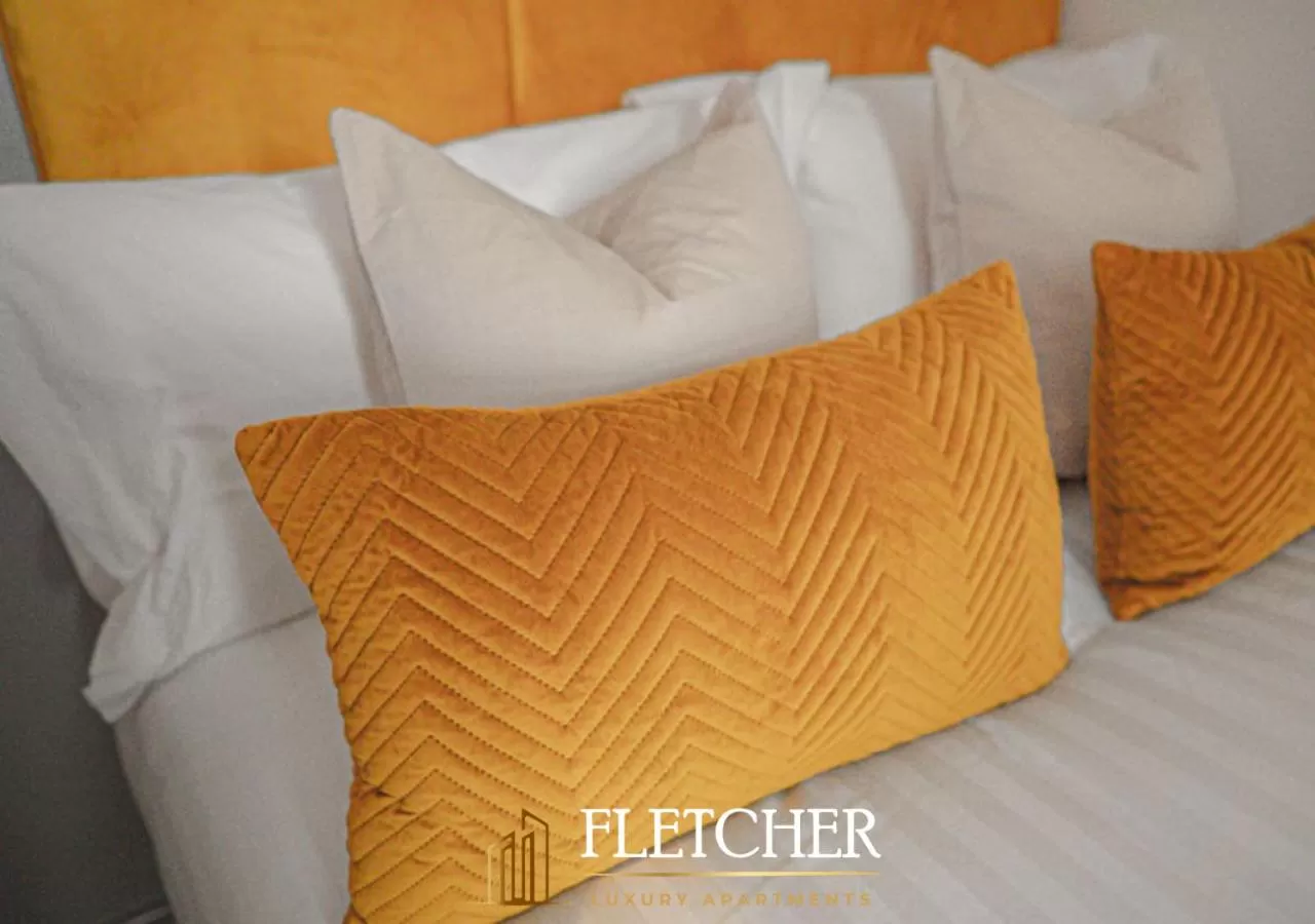 Bed in Spire Accommodations Ltd