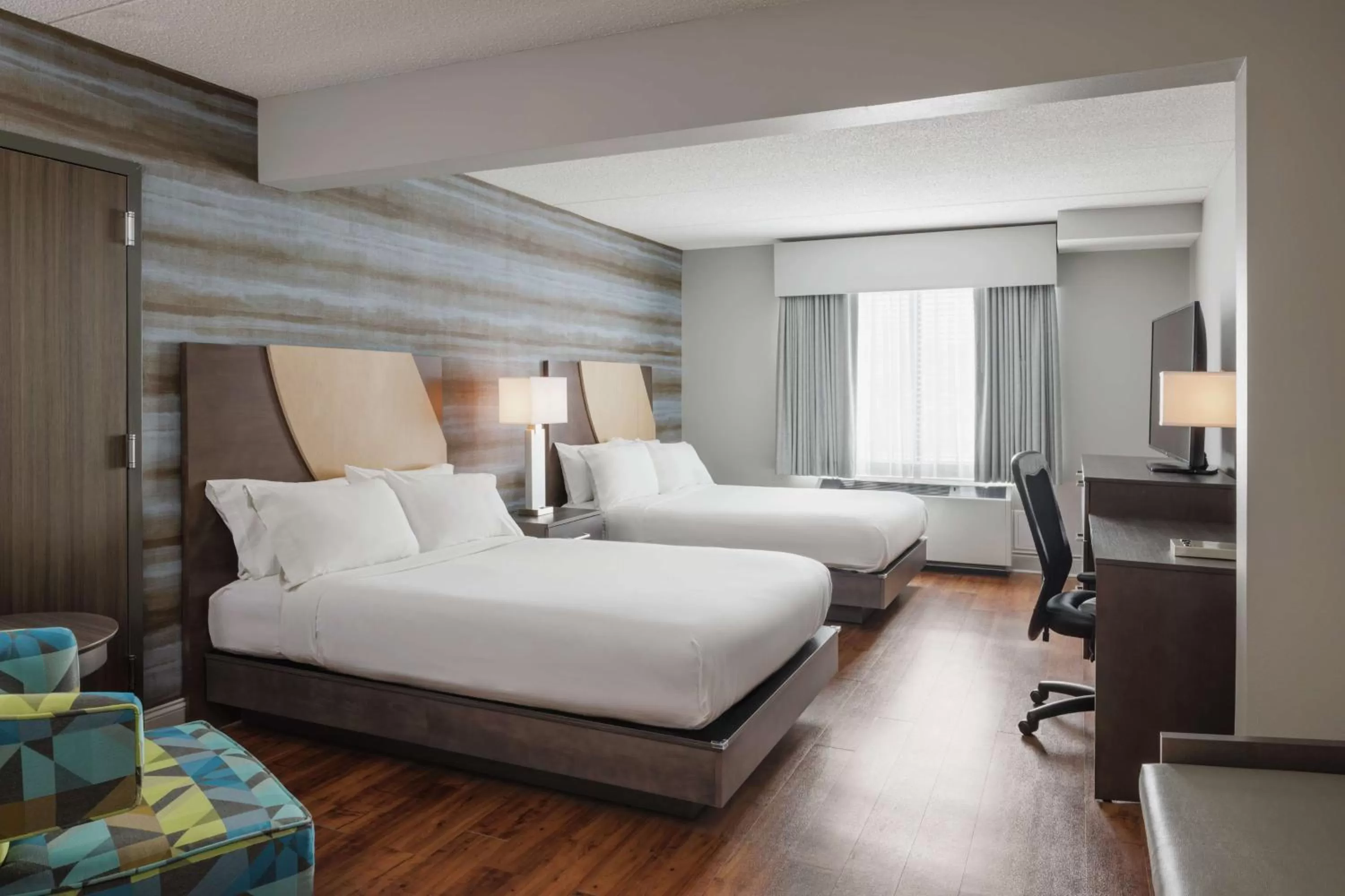 Bed in Hotel Trilogy Albany Airport, Tapestry Collection by Hilton