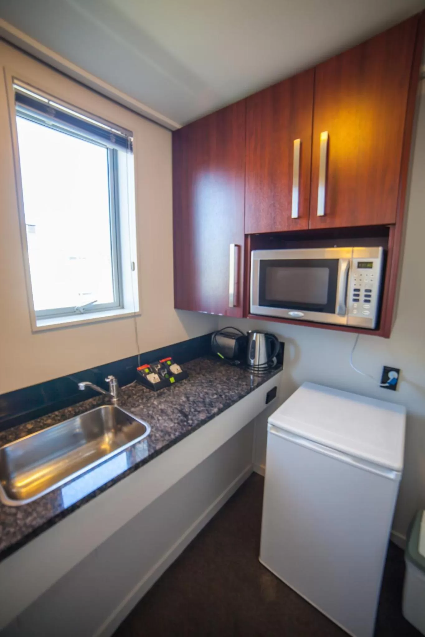 Kitchen or kitchenette in City Central Motel Apartments