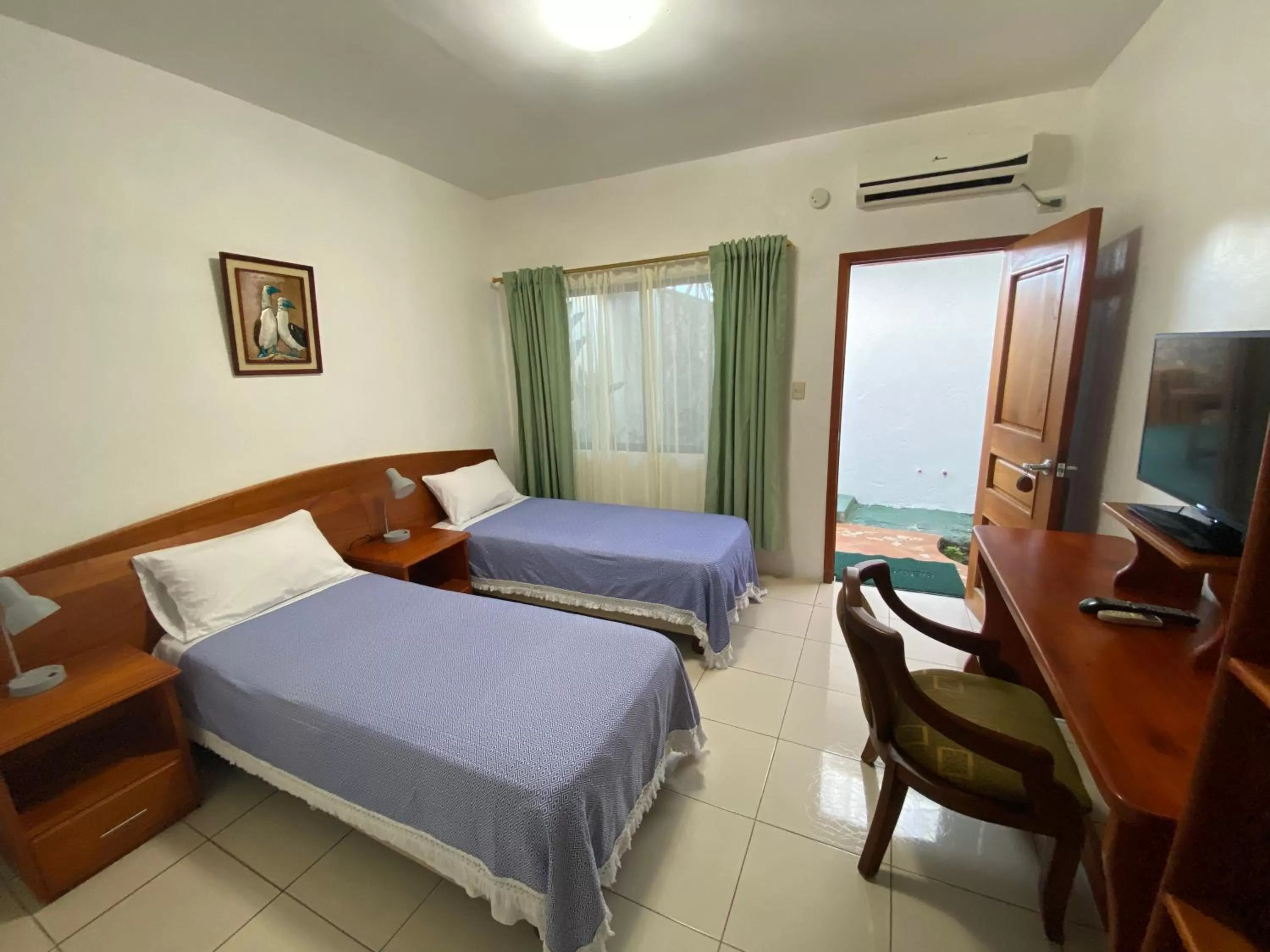 Photo of the whole room in La Peregrina Galapagos B&B