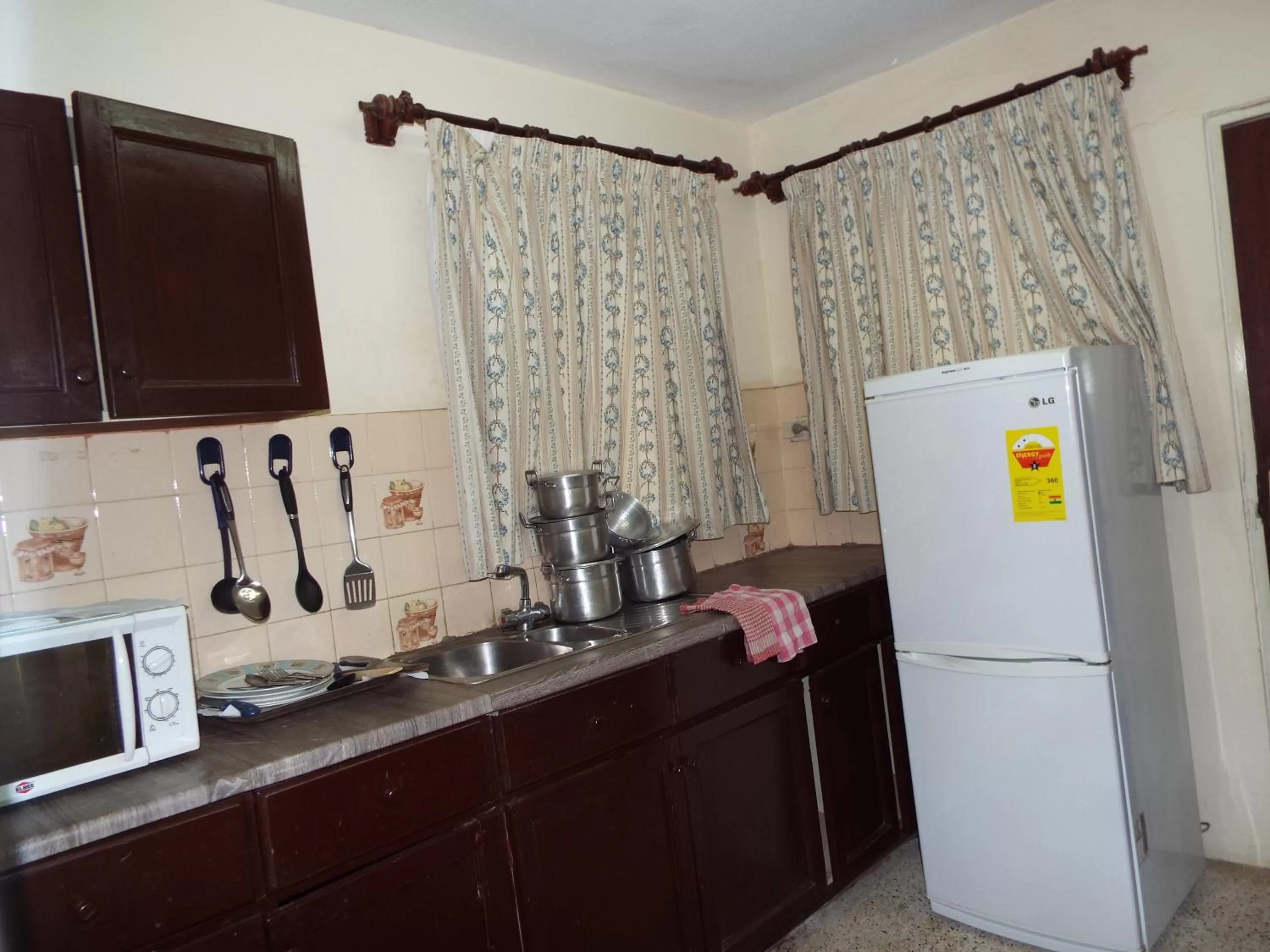 Kitchen or kitchenette in Pekan Hotel