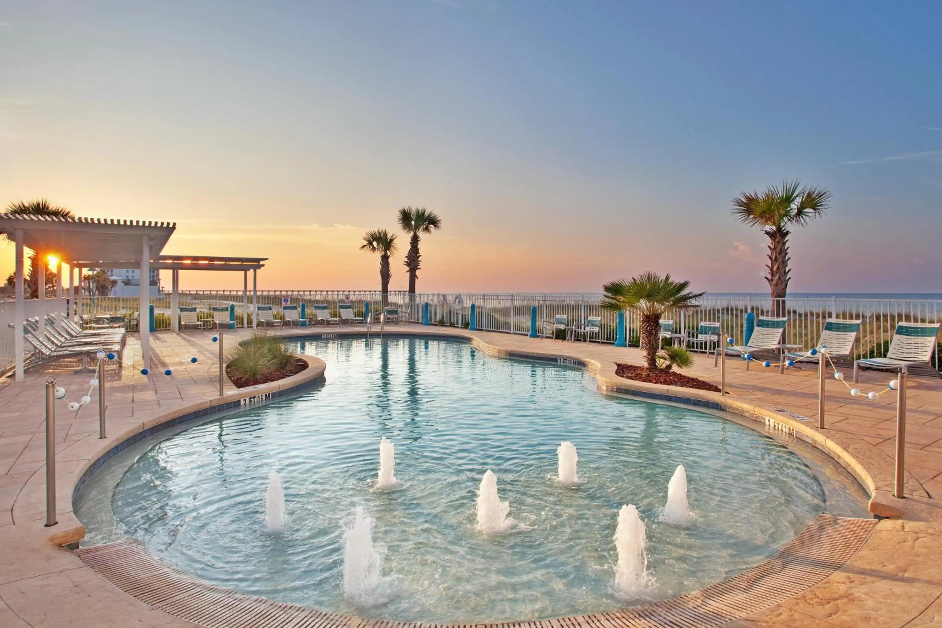 Swimming pool in Holiday Inn Express Pensacola Beach by IHG