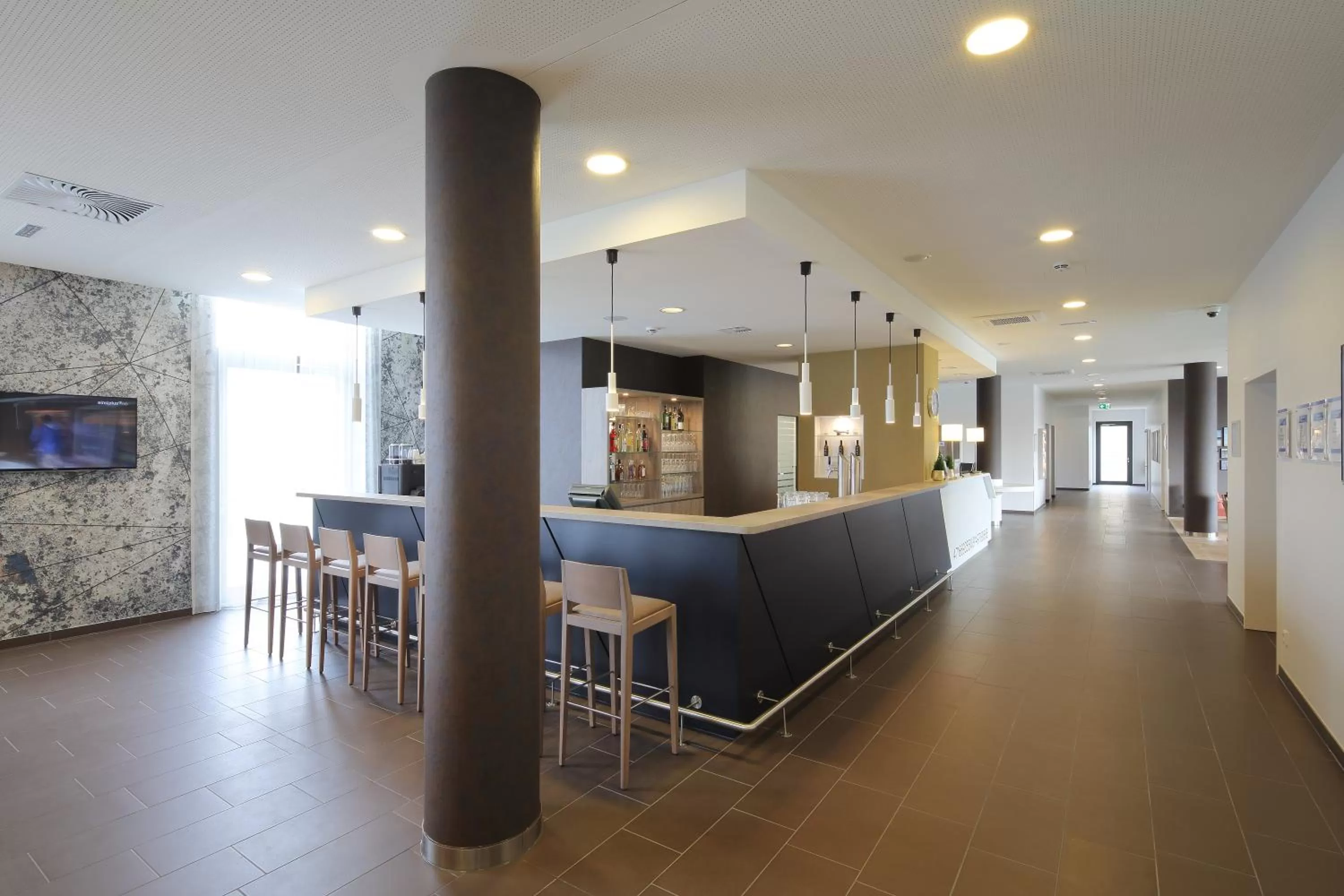 Lounge or bar in Holiday Inn Express Friedrichshafen by IHG