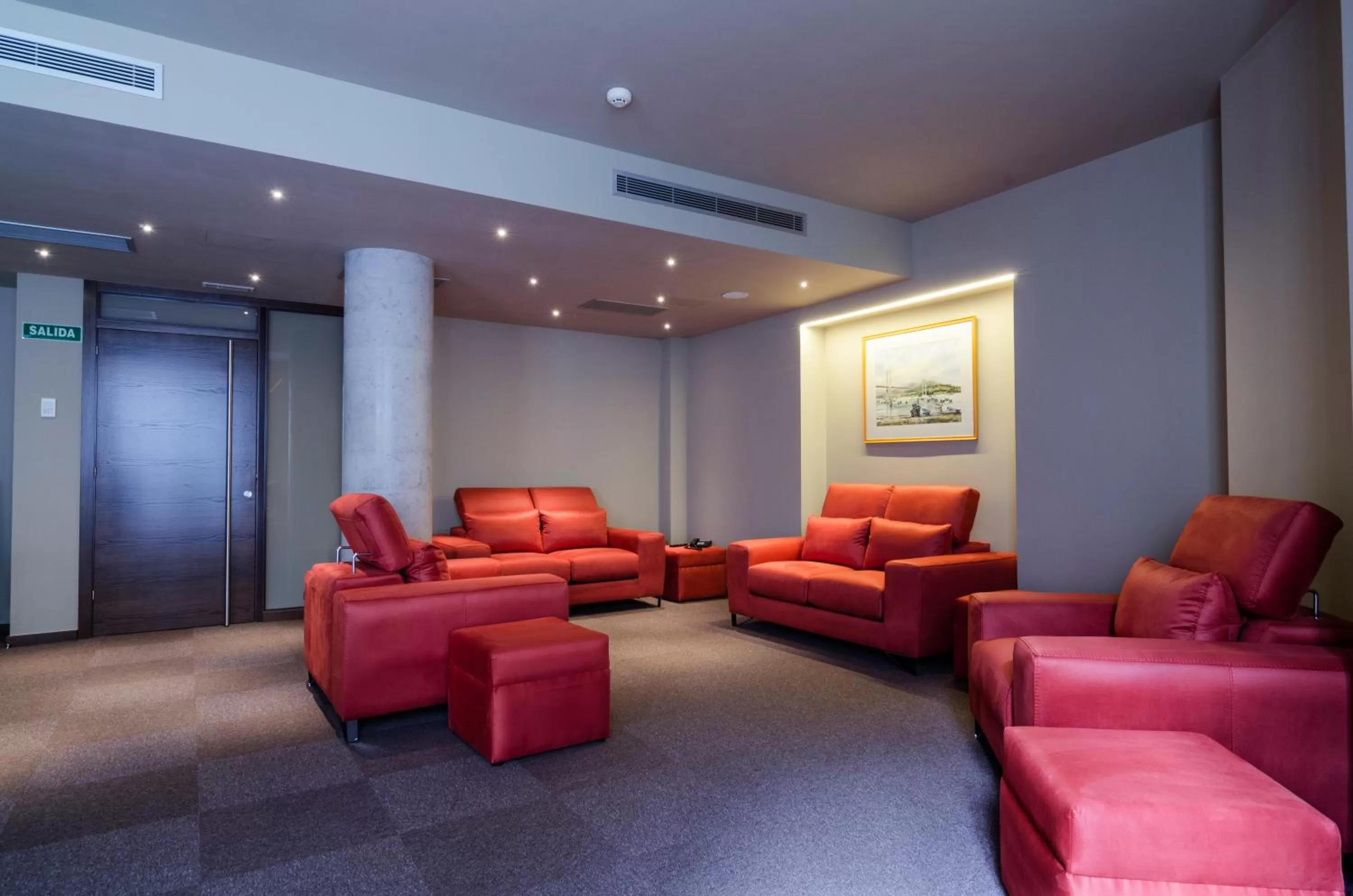 Communal lounge/ TV room in Agua de Mar Hotel Boutique