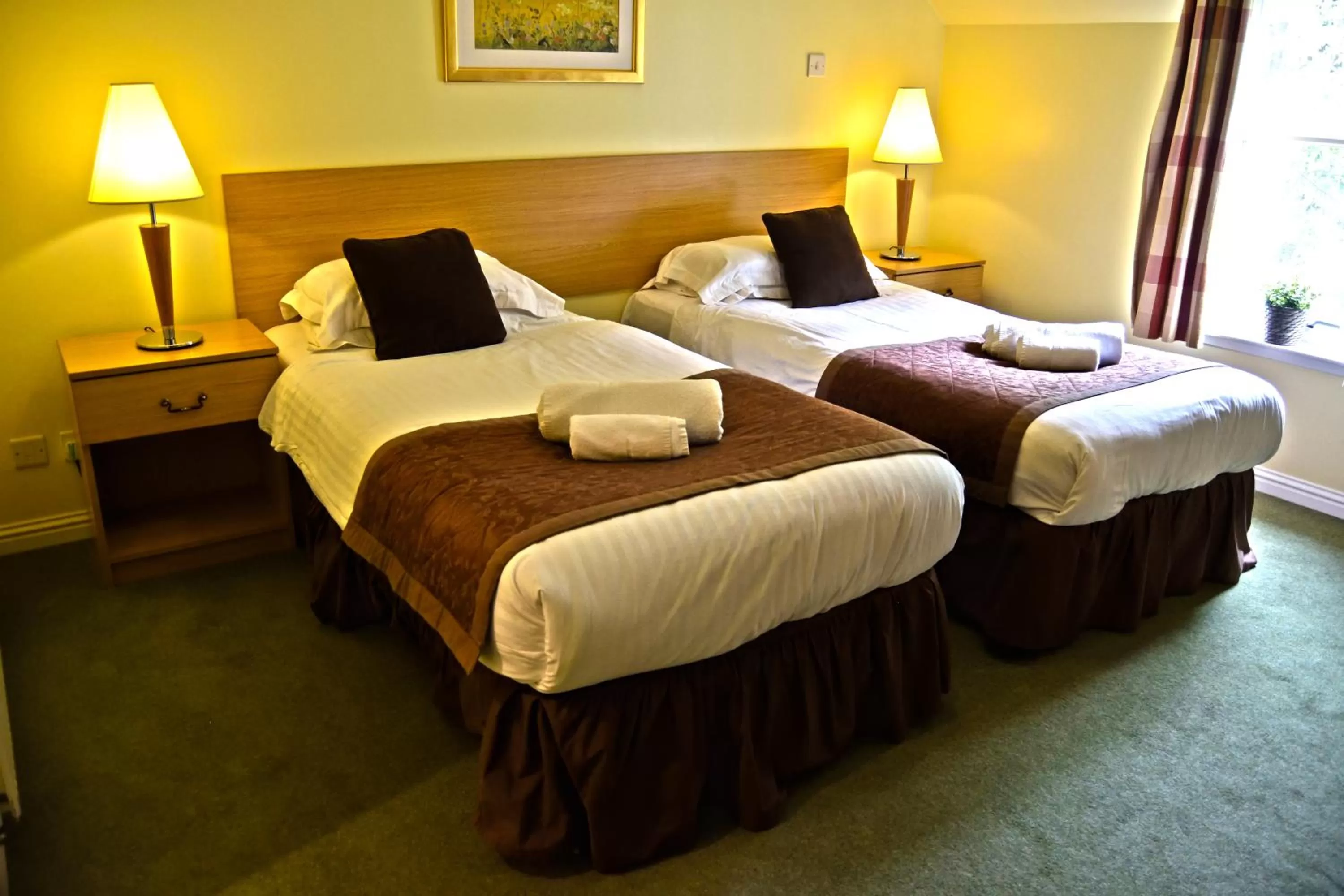 Bed in Bridge of Cally Hotel