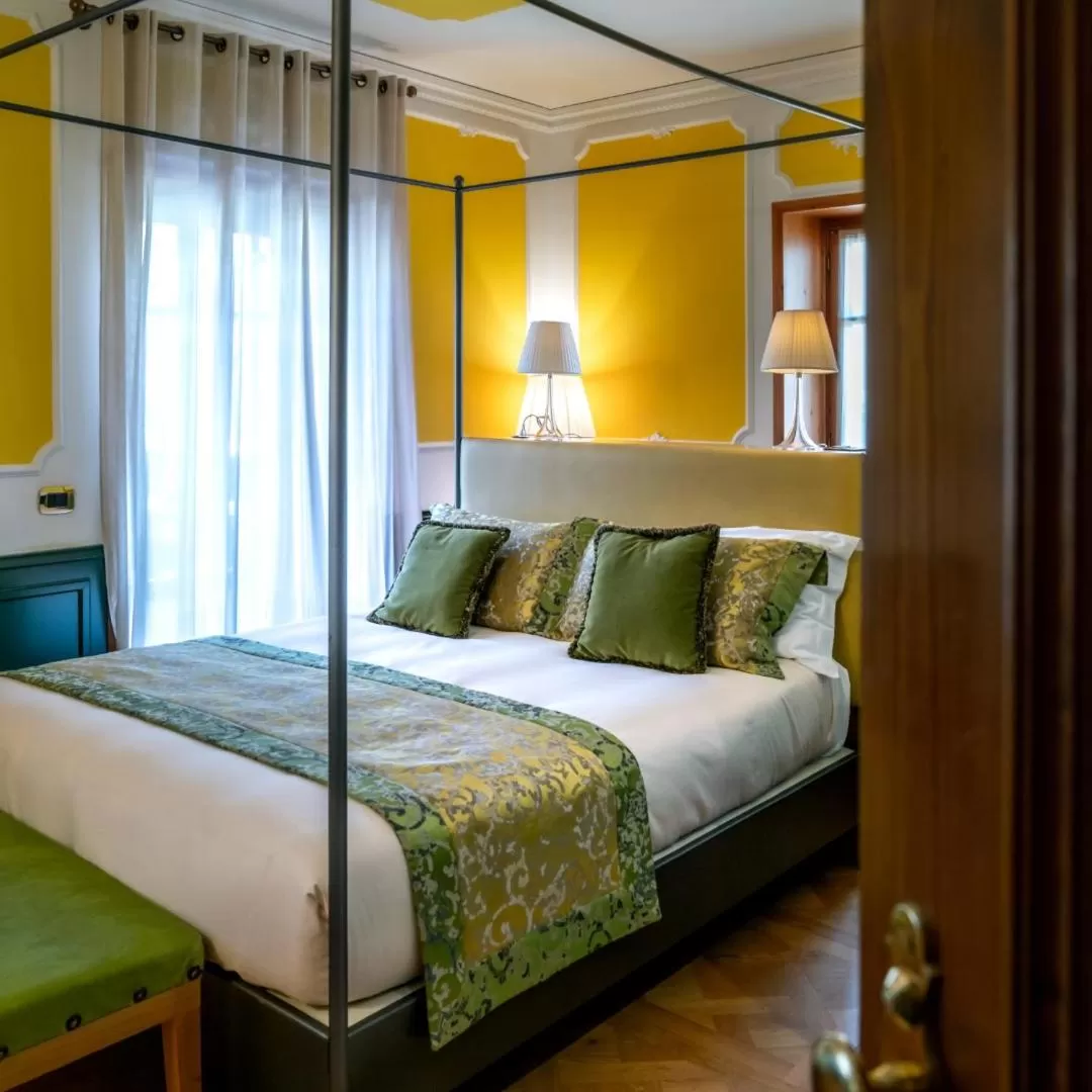 Photo of the whole room, Bed in Ambra Cortina Luxury&Fashion Hotel