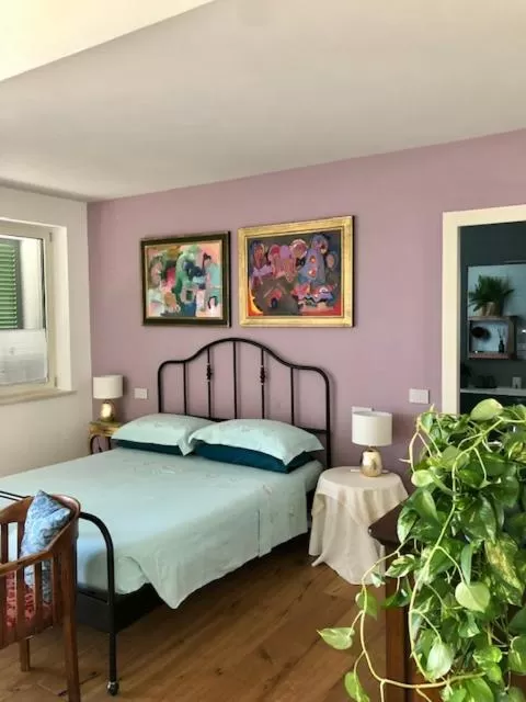 Bed in GIULIVETO Bed and Breakfast