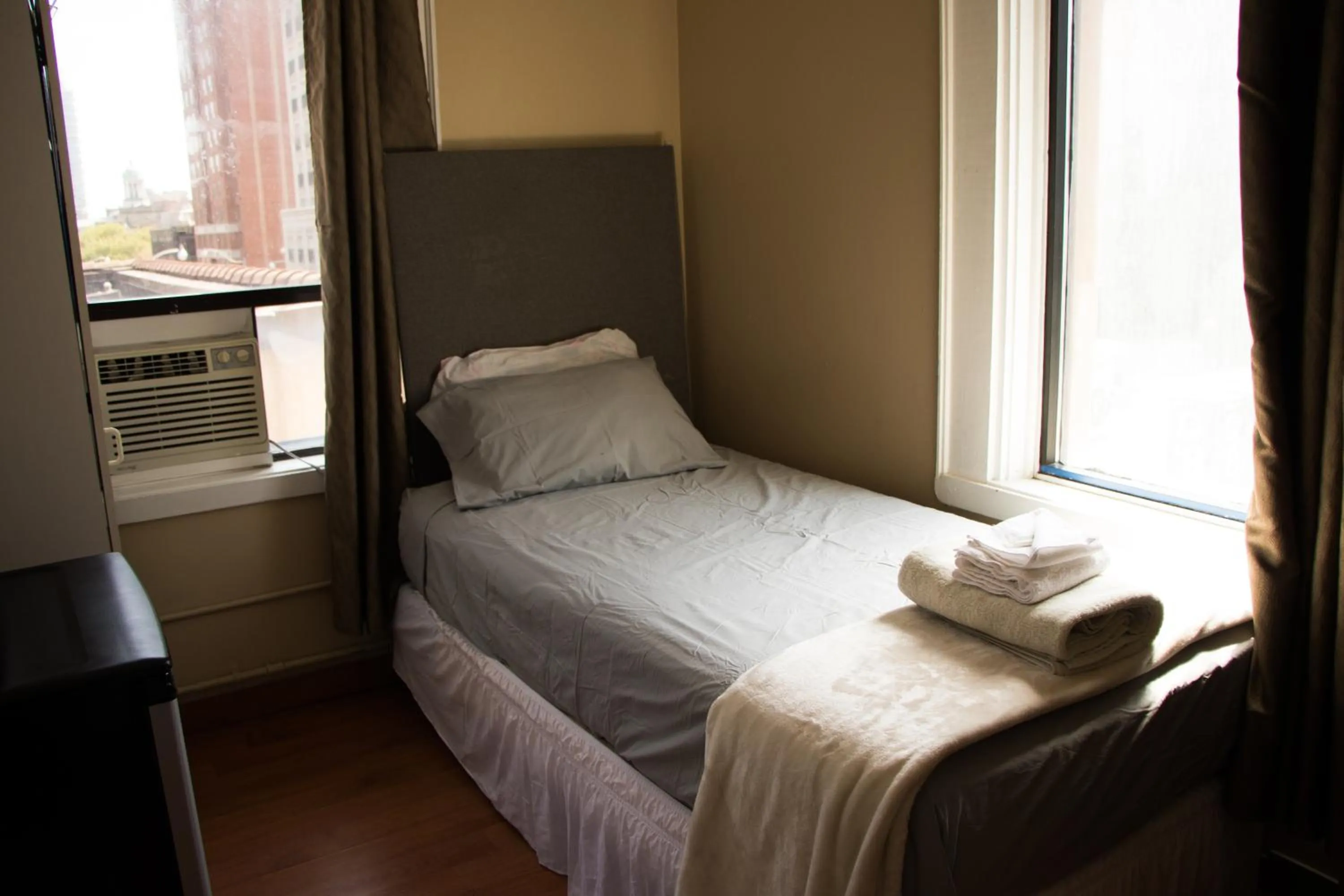 Bed in Saint Lawrence Residences and Suites