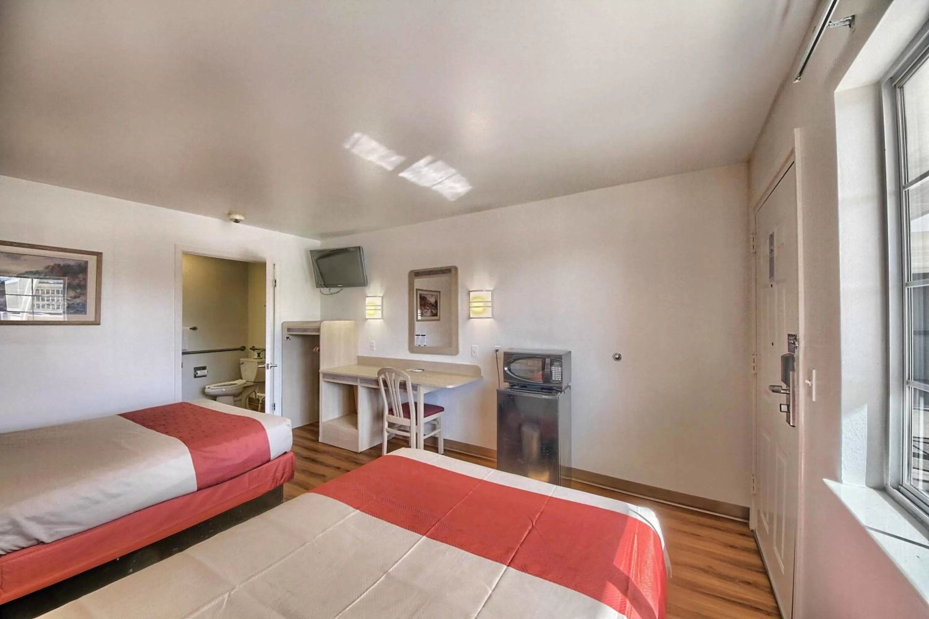 Toilet, Bed in Motel 6-Kerrville, TX