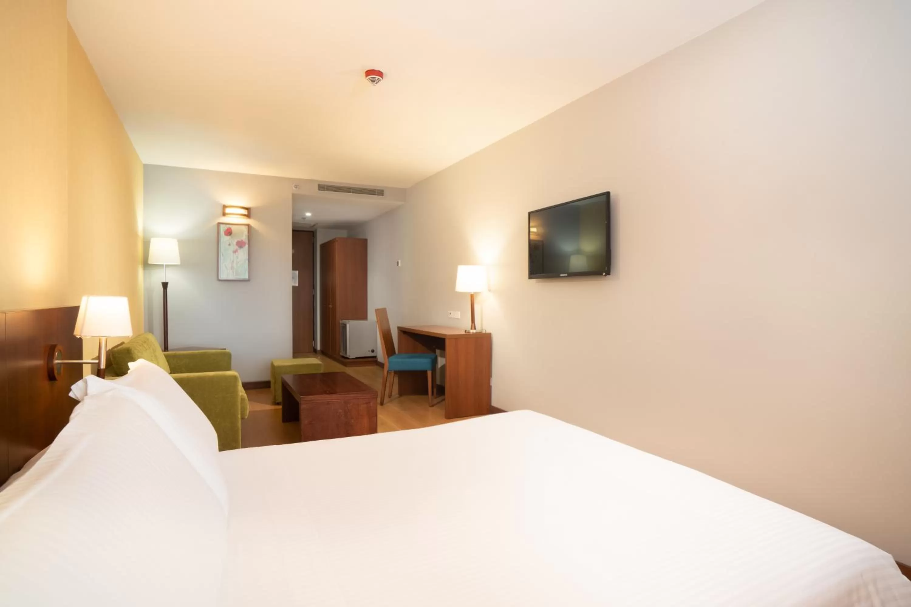 Seating area, Bed in Hotel Habitel Select