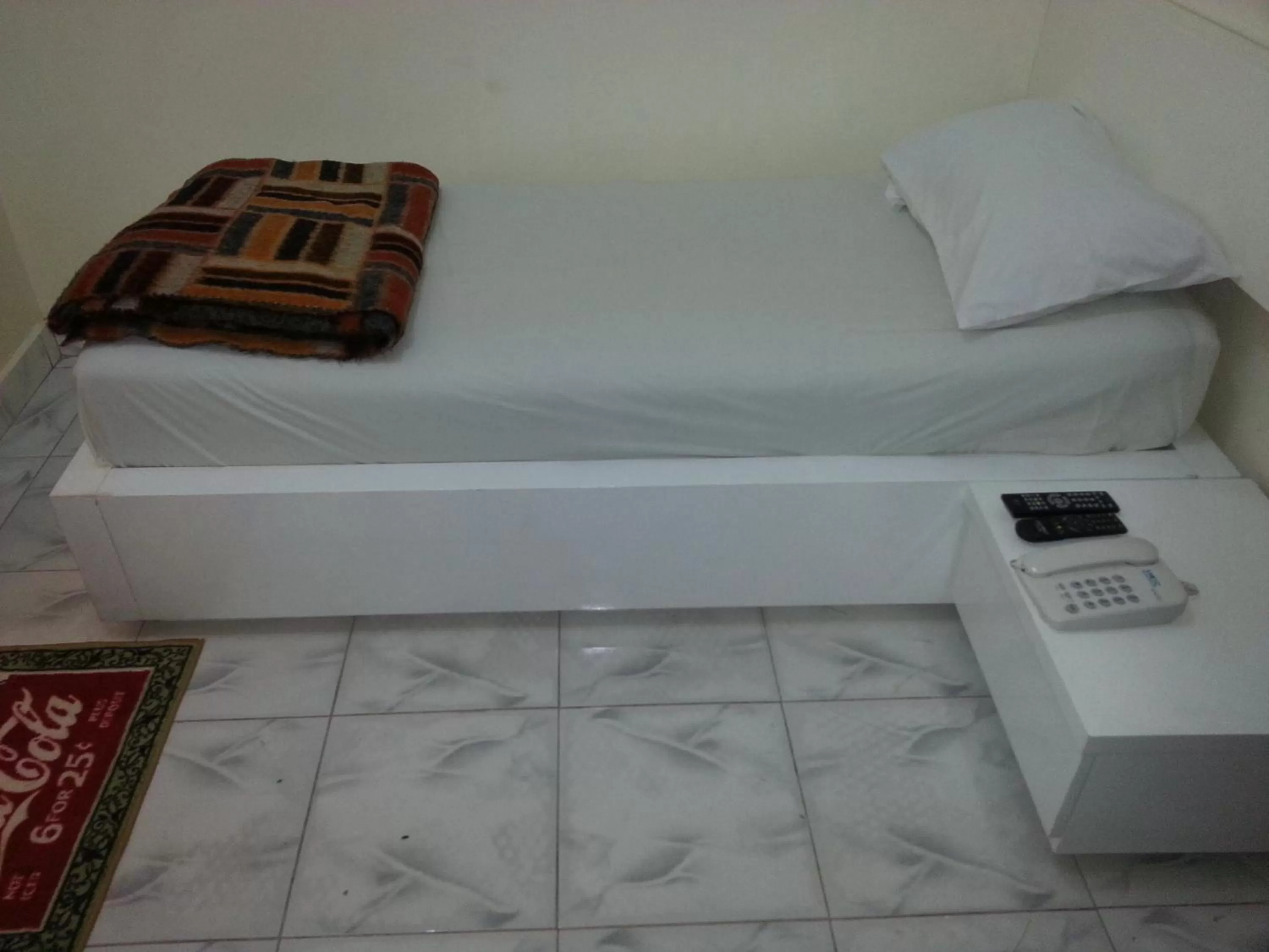 Bed in Woodpecker Resort Hotel