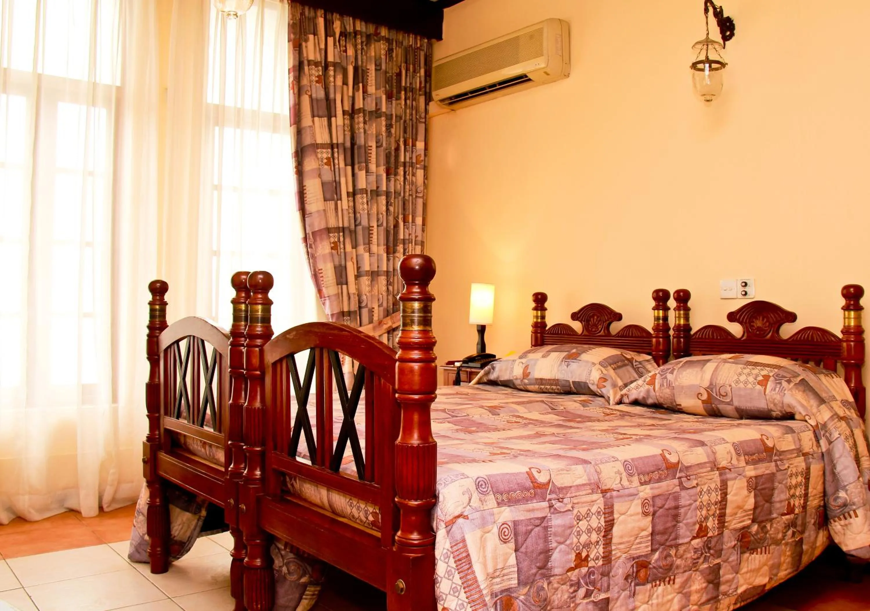 Bed in Grand Oriental Hotel