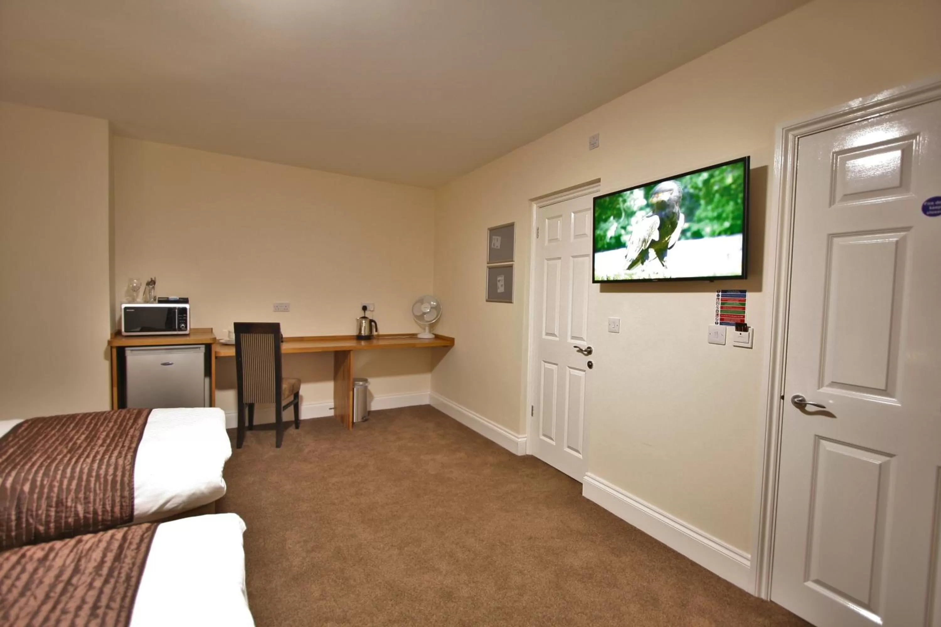 Bed in New County Hotel & Serviced Apartments by RoomsBooked