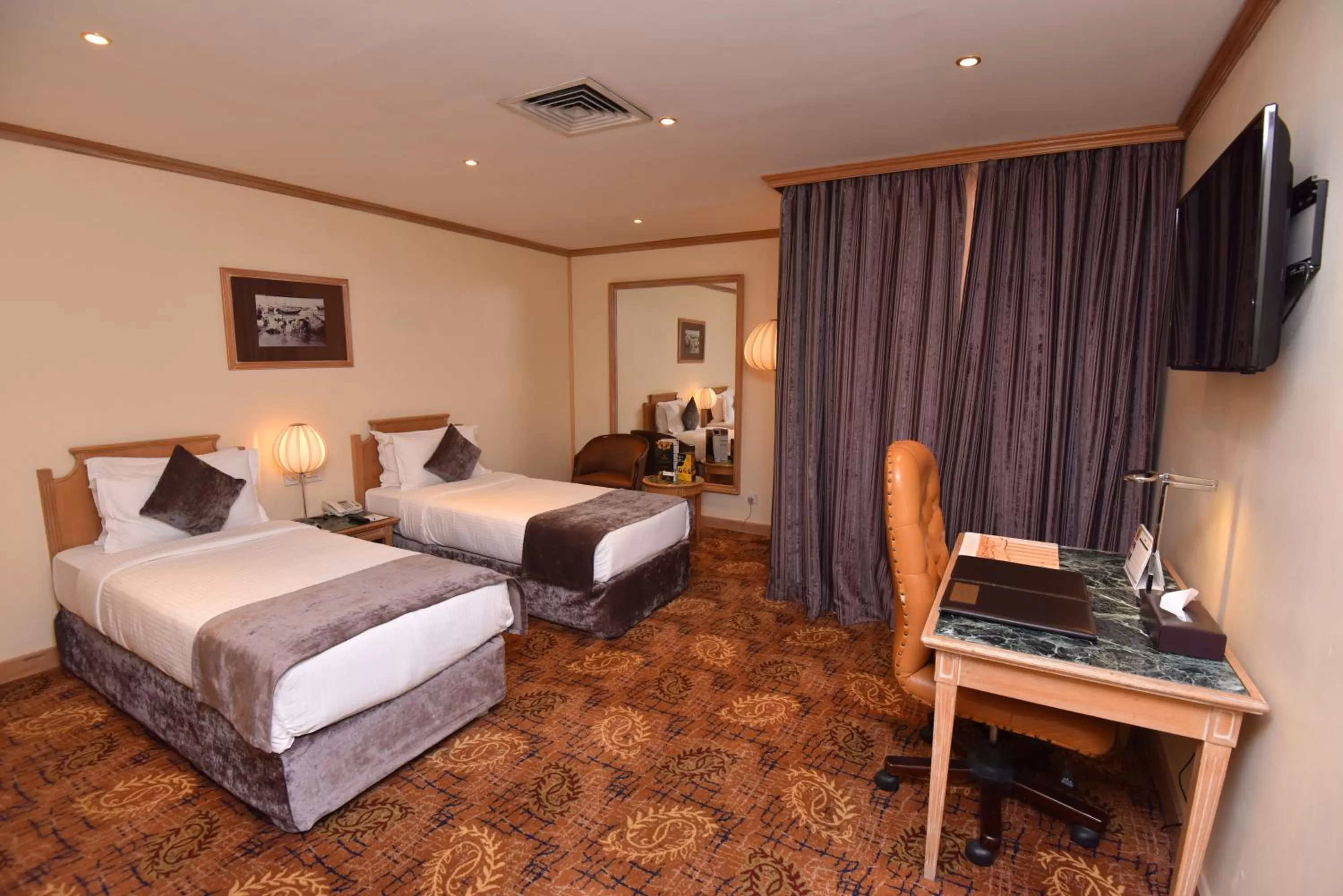 Bedroom in Inn & Go Kuwait Plaza