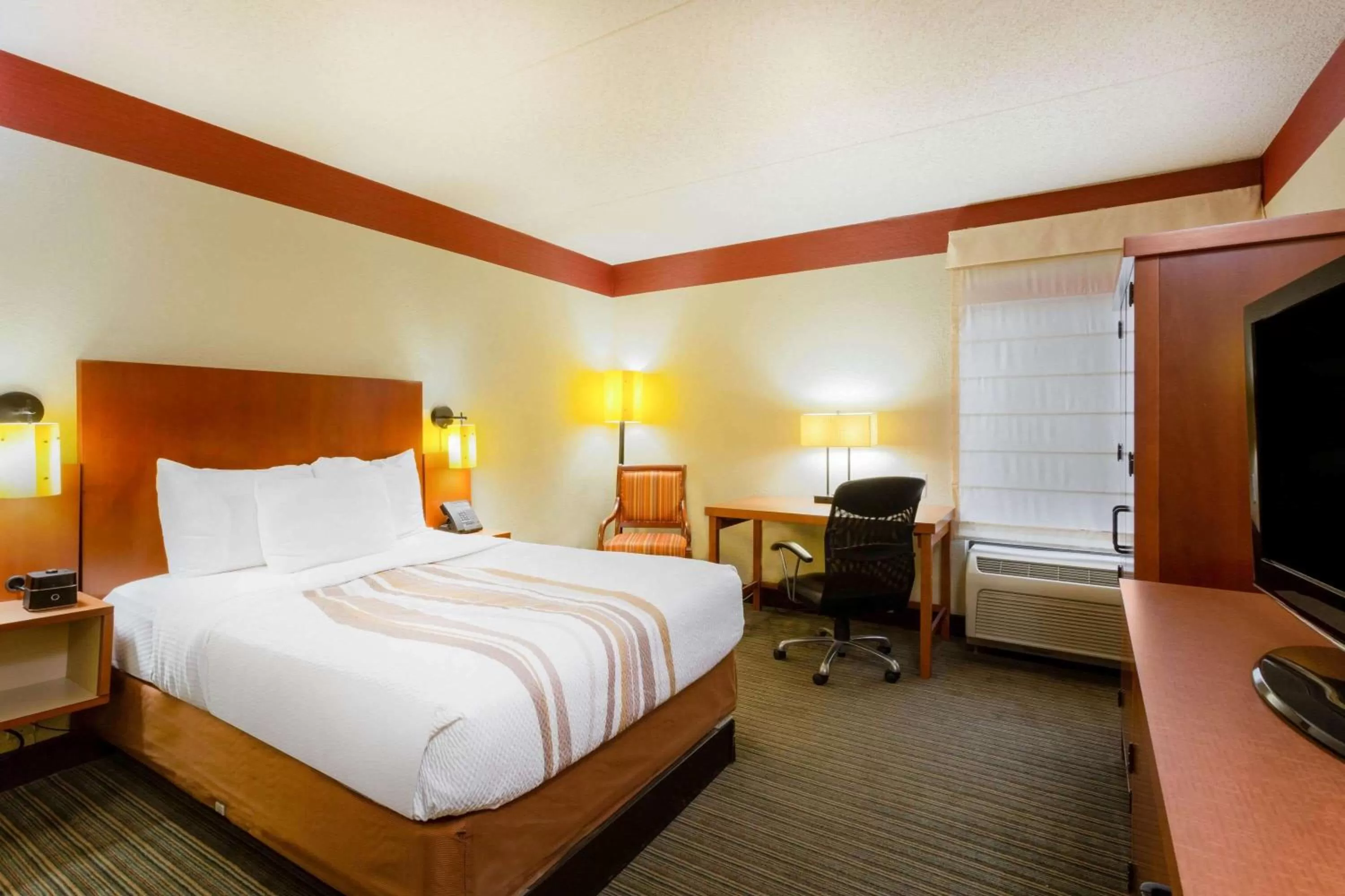 Photo of the whole room, Bed in CLT Airport Inn & Suites