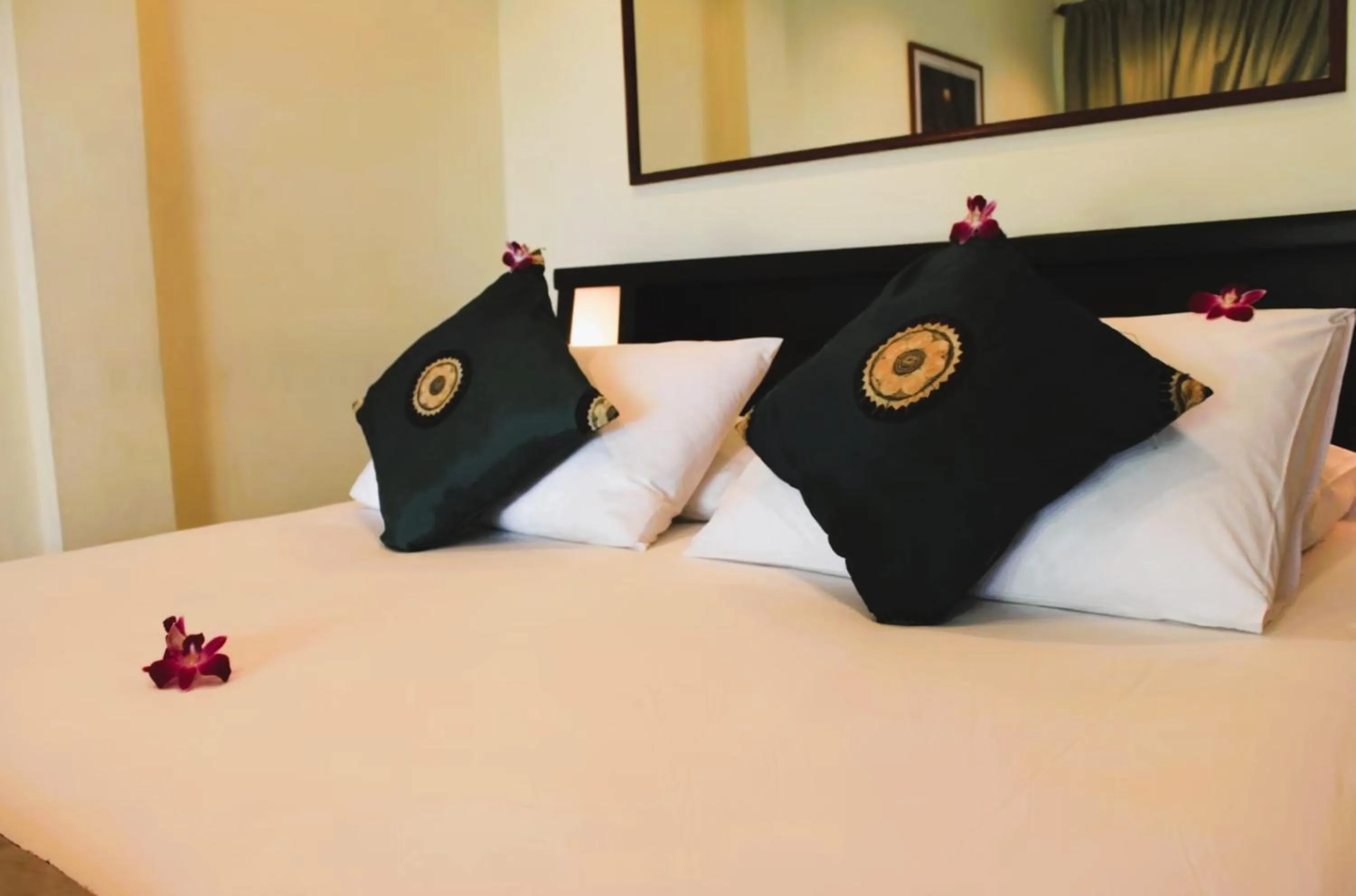 Bed in The Waterfront Hotel at Fisherman's Village