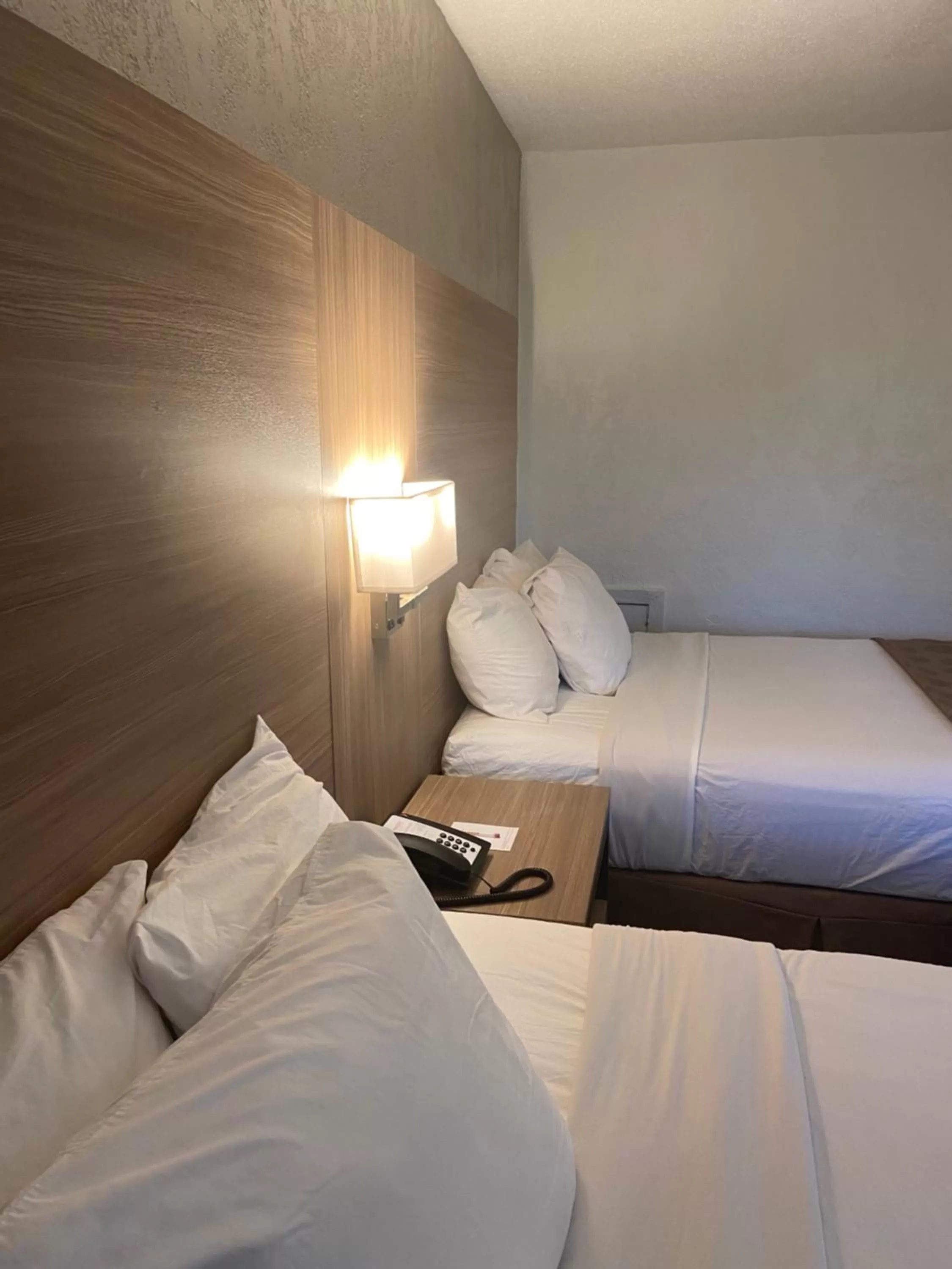 Bed in Ramada by Wyndham West Atlantic City