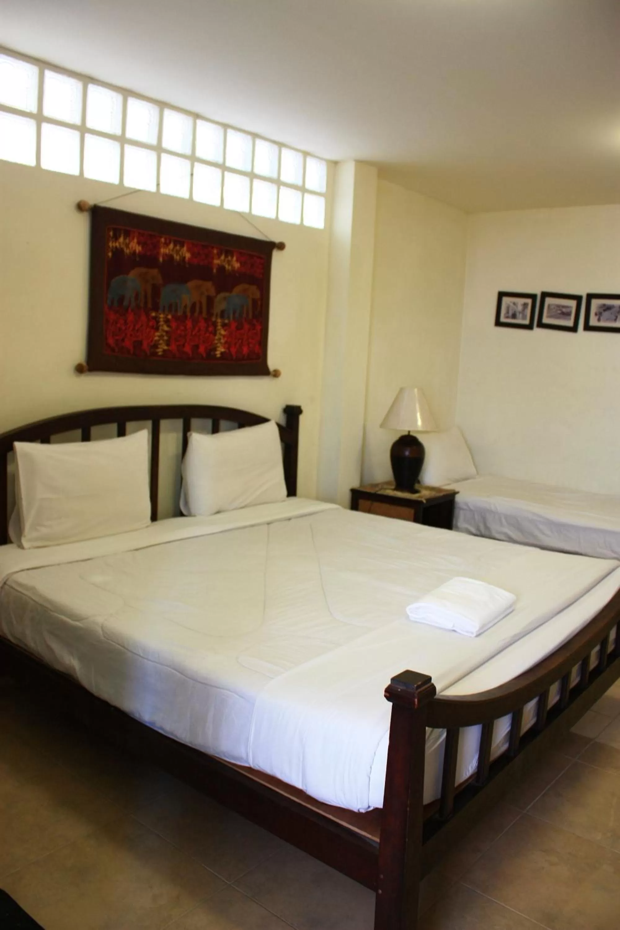 Bed in โรงแรมตีฆ้อง - Tri Gong Hotel