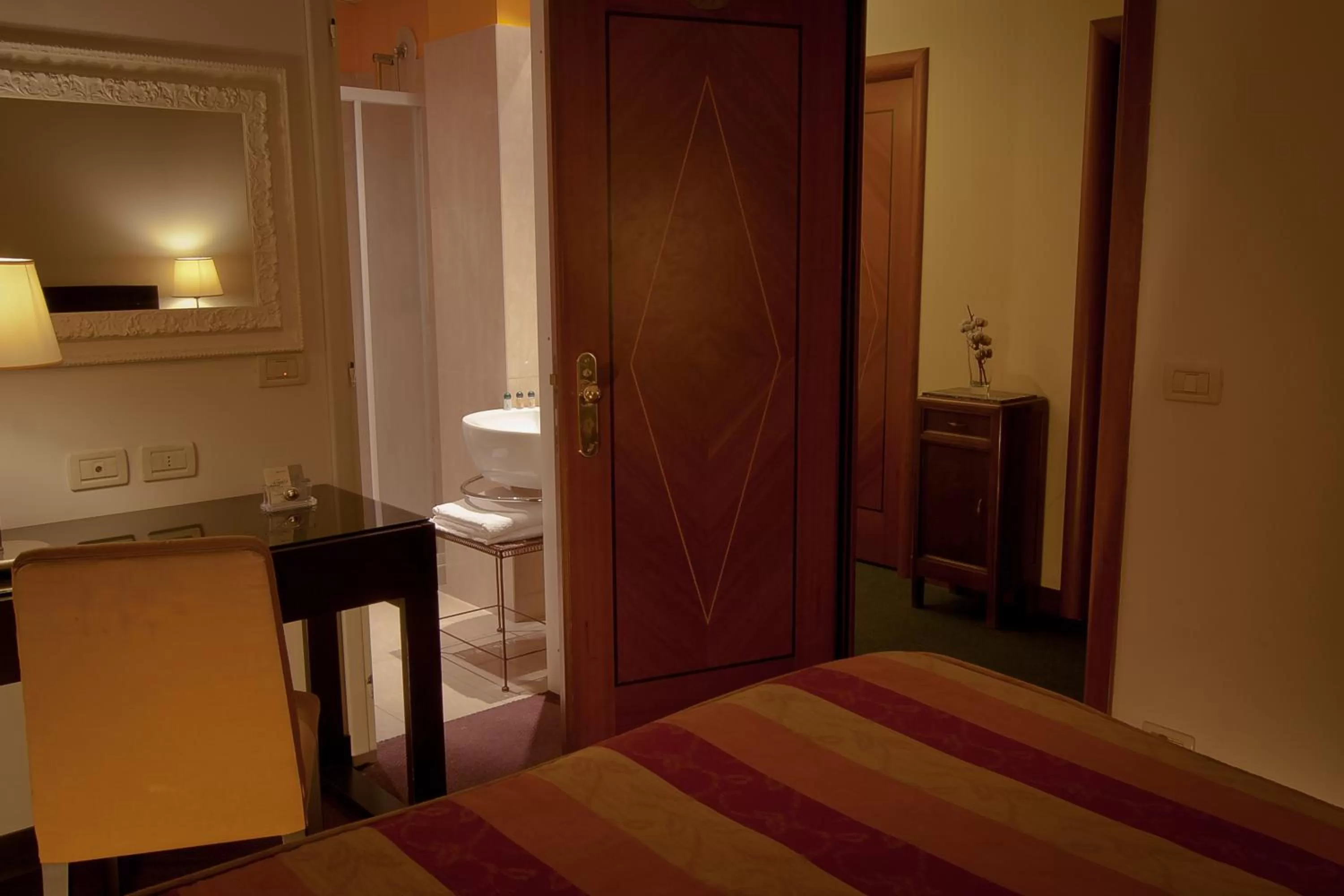 Bed in Hotel Arnolfo & Aqua Laetitia Spa & Beauty