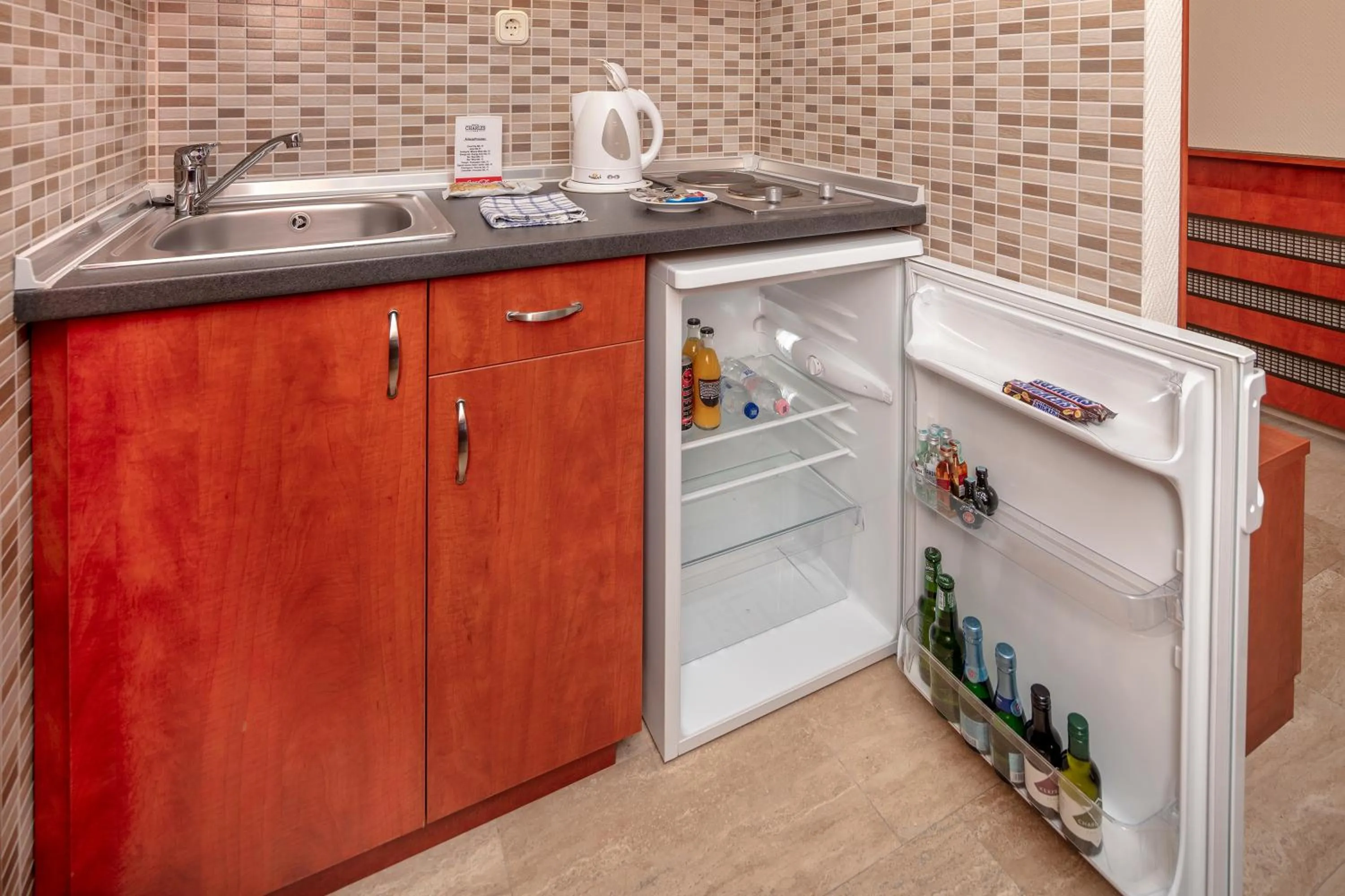 Kitchen or kitchenette in Hotel Charles