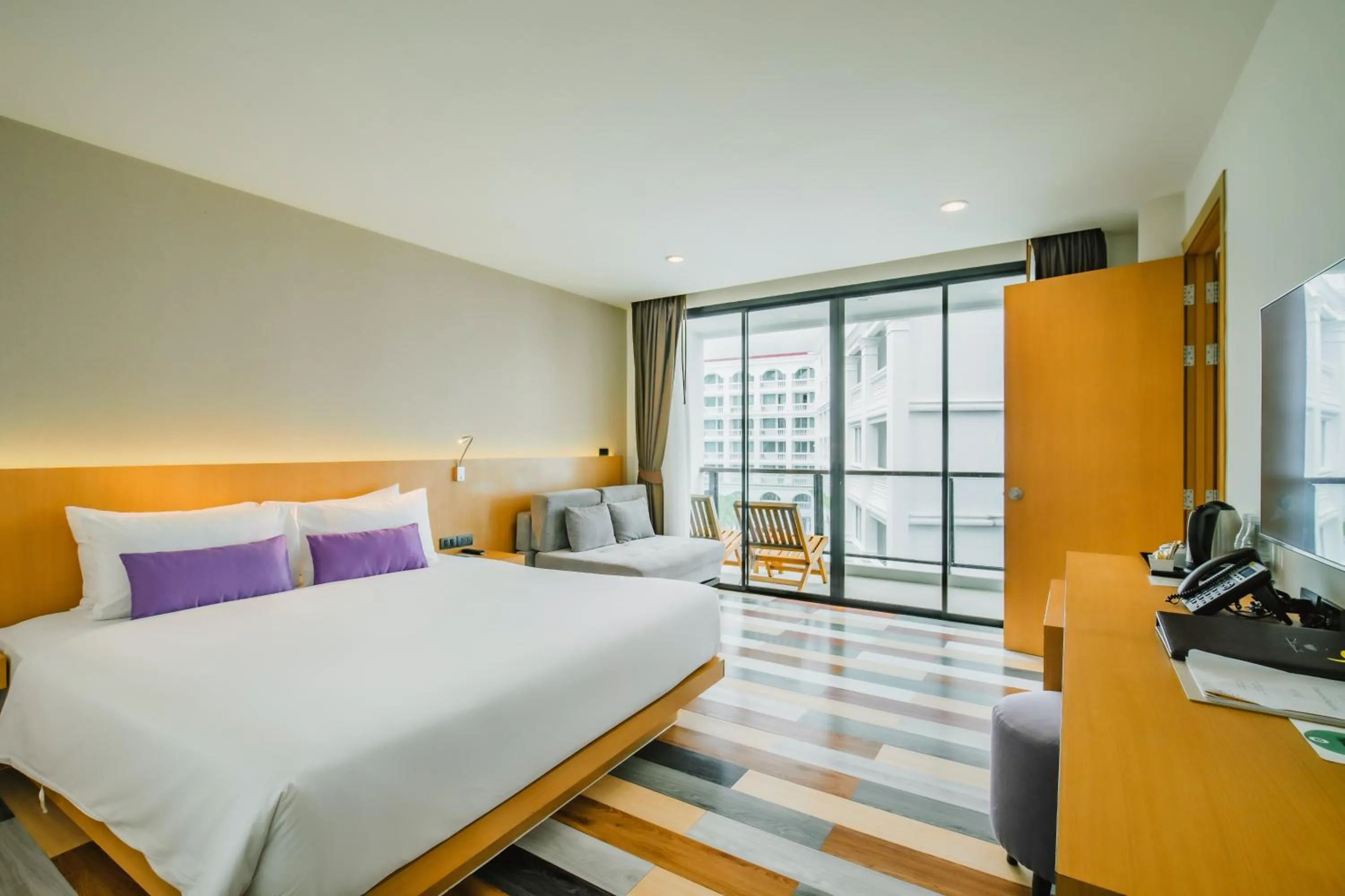 Photo of the whole room, Bed in The Lunar Patong