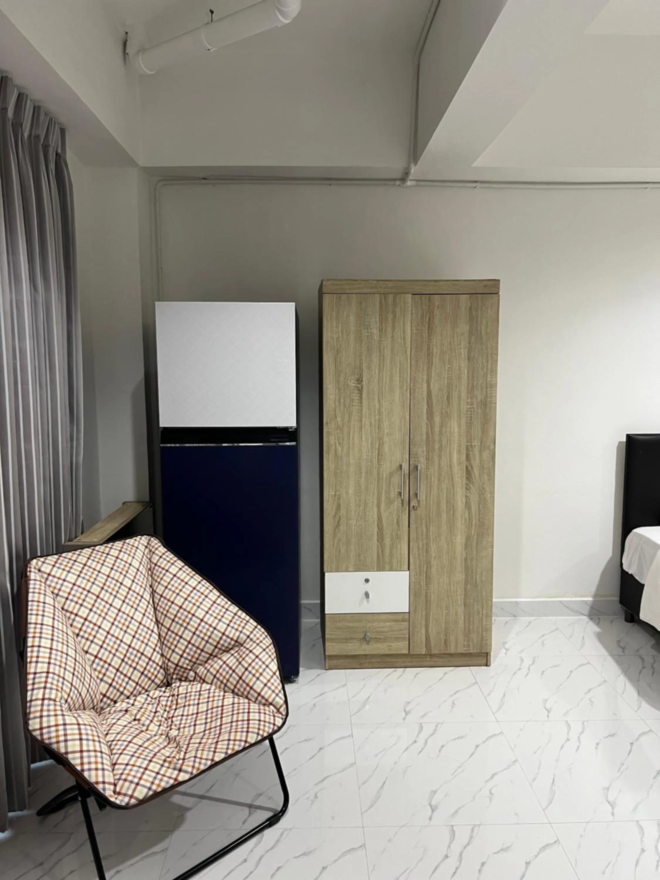 Seating area in Mall Suites Hotel