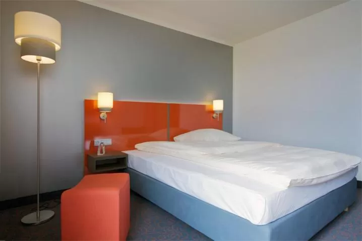 Bed in iQ-Hotel Ulm
