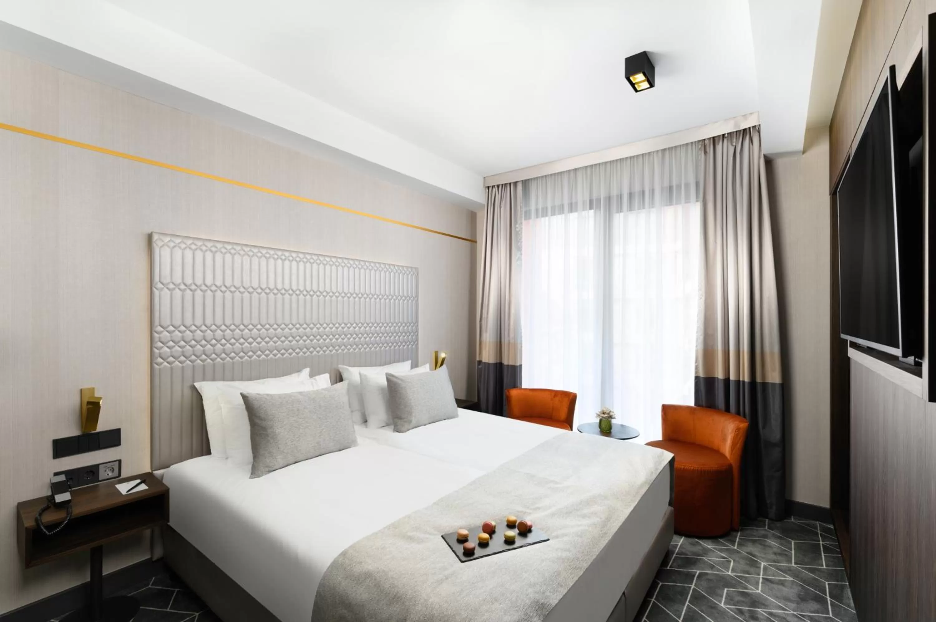 Photo of the whole room, Bed in Emerald Hotel by Continental Group
