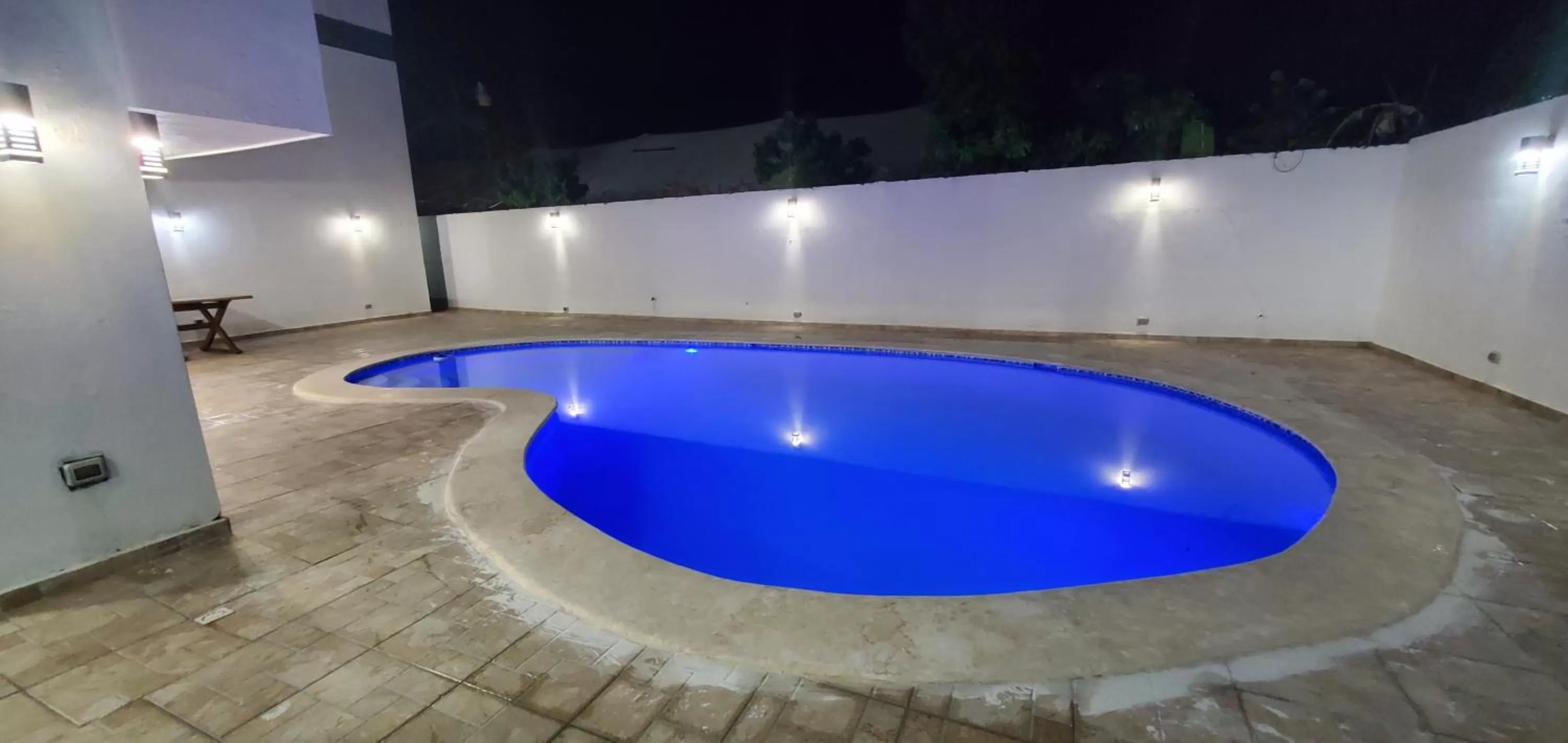 Swimming pool in Boca Grande Hotel Suites