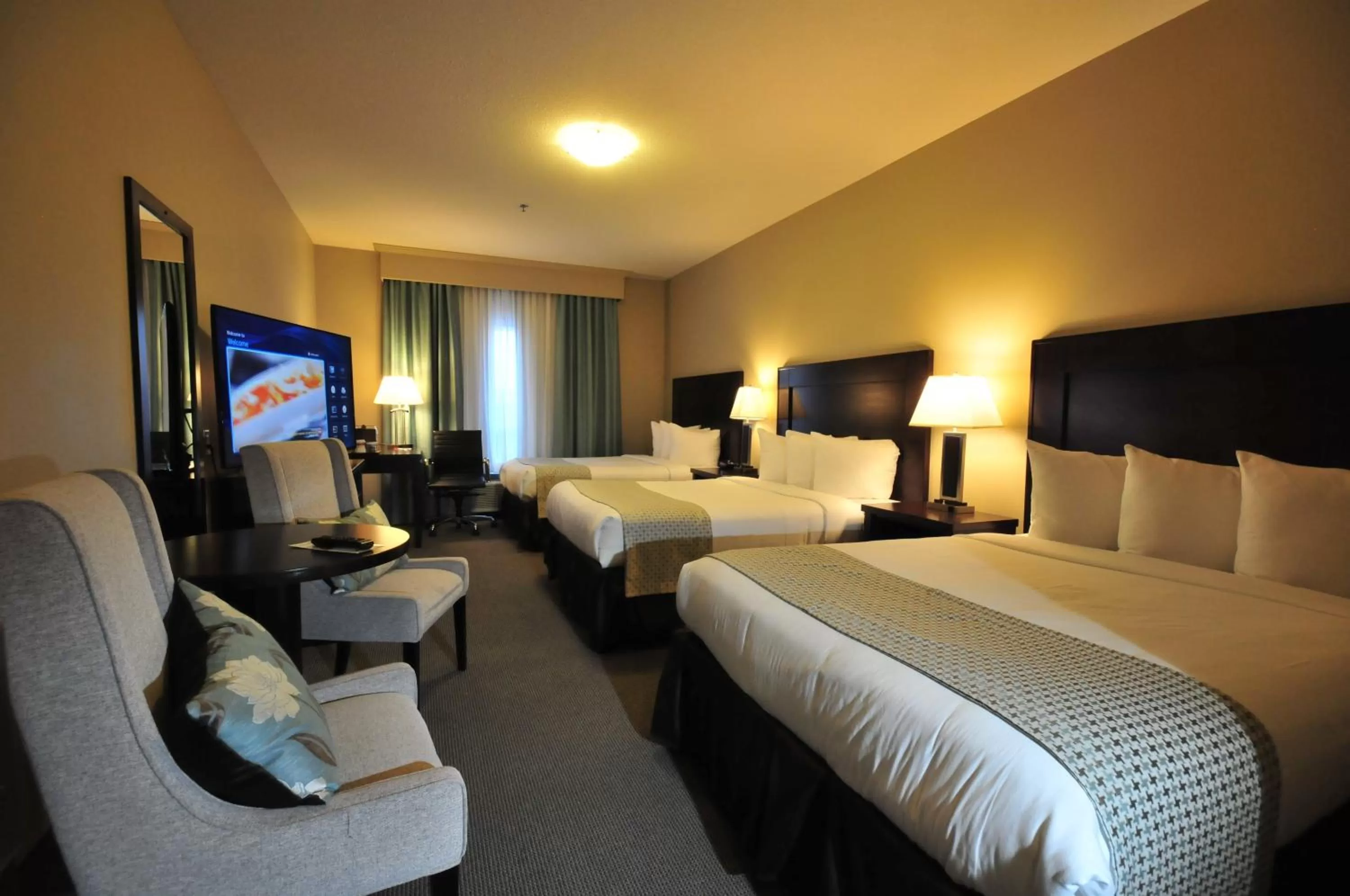 Bedroom, Bed in Ramada by Wyndham Emerald Park/Regina East