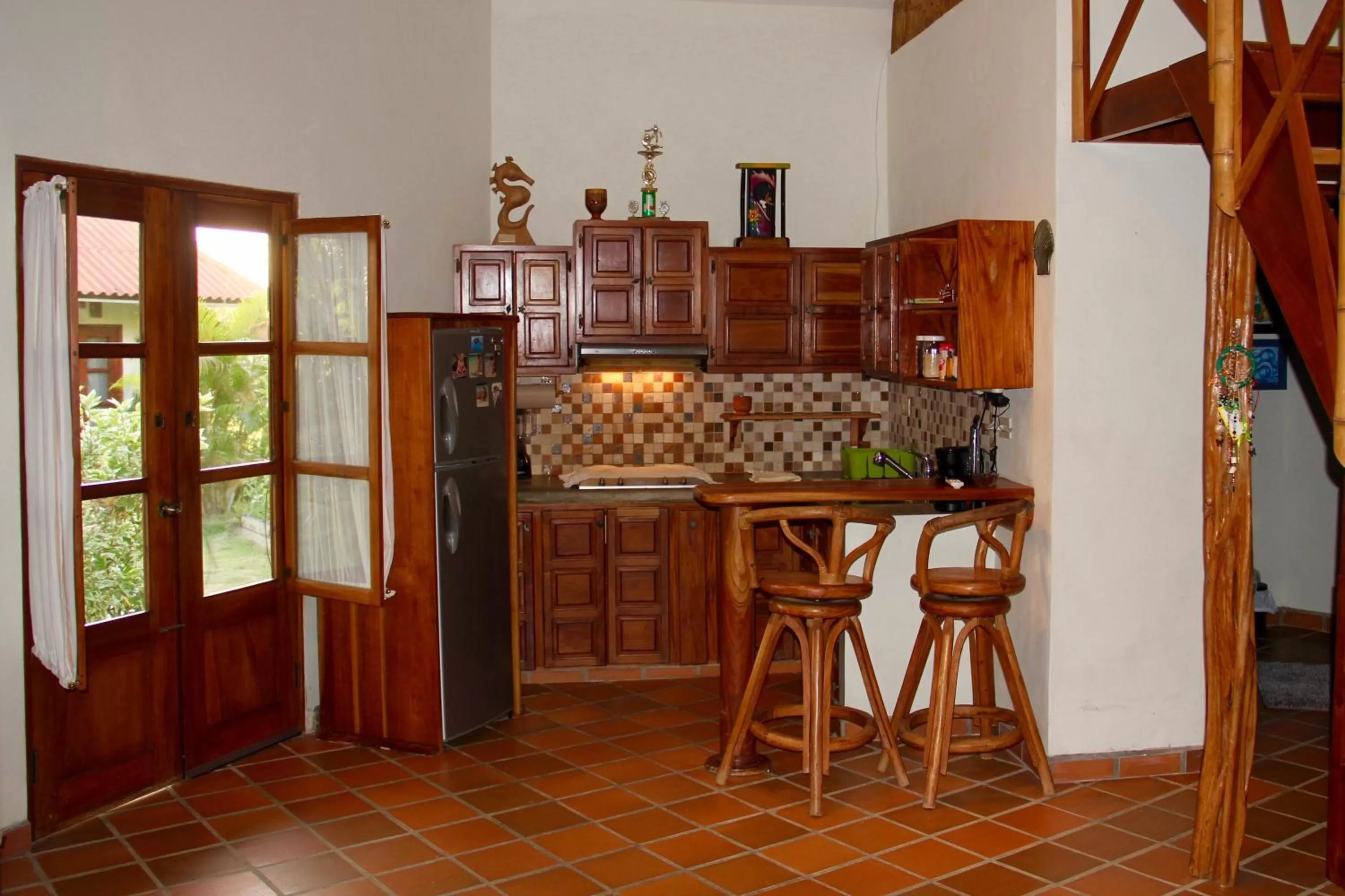 Kitchen/Kitchenette in Cabañas La Casa de Pucha