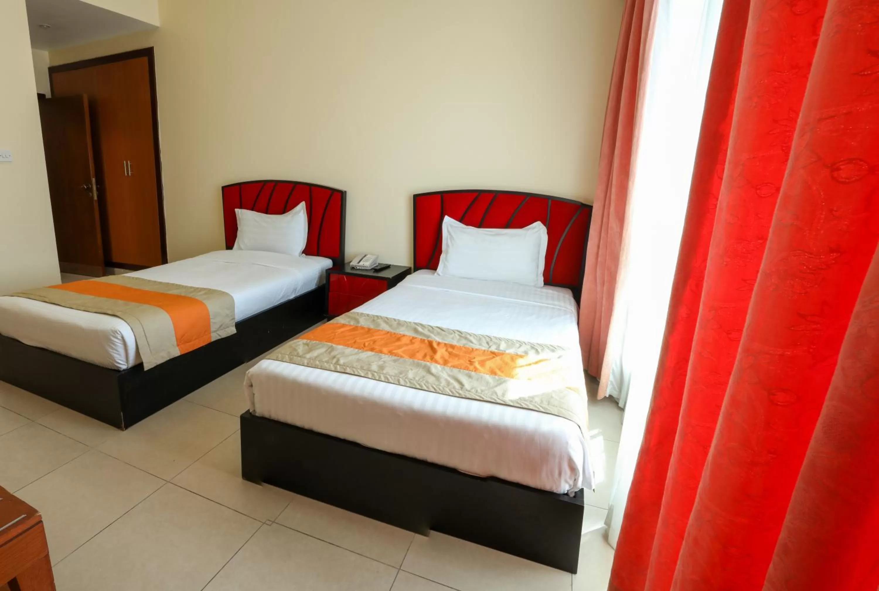 Bed in Wescott Plaza Hotel Apartments LLC Formerly West Zone Plaza Hotel Apts