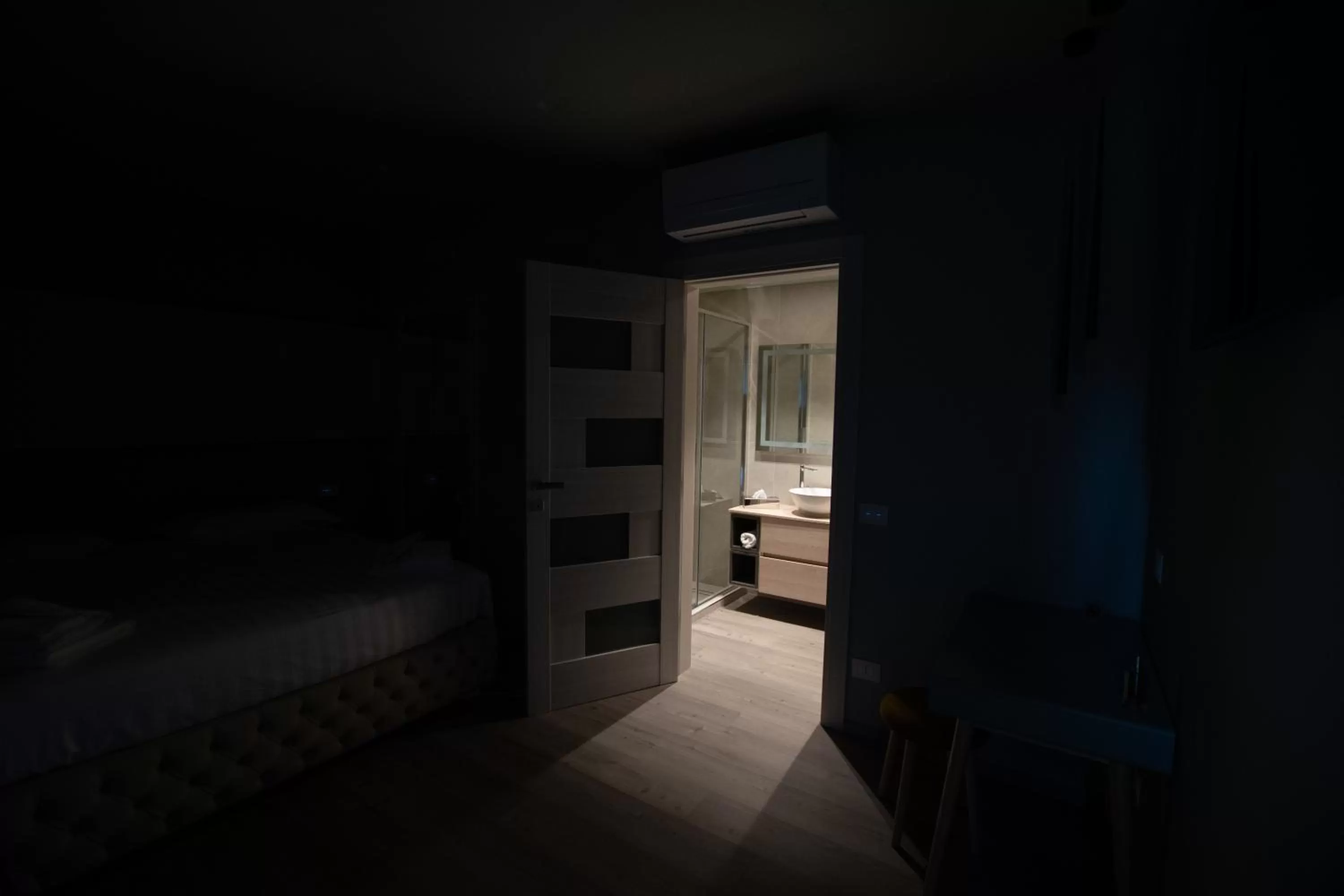 Bed in DiVino Rooms Deluxe