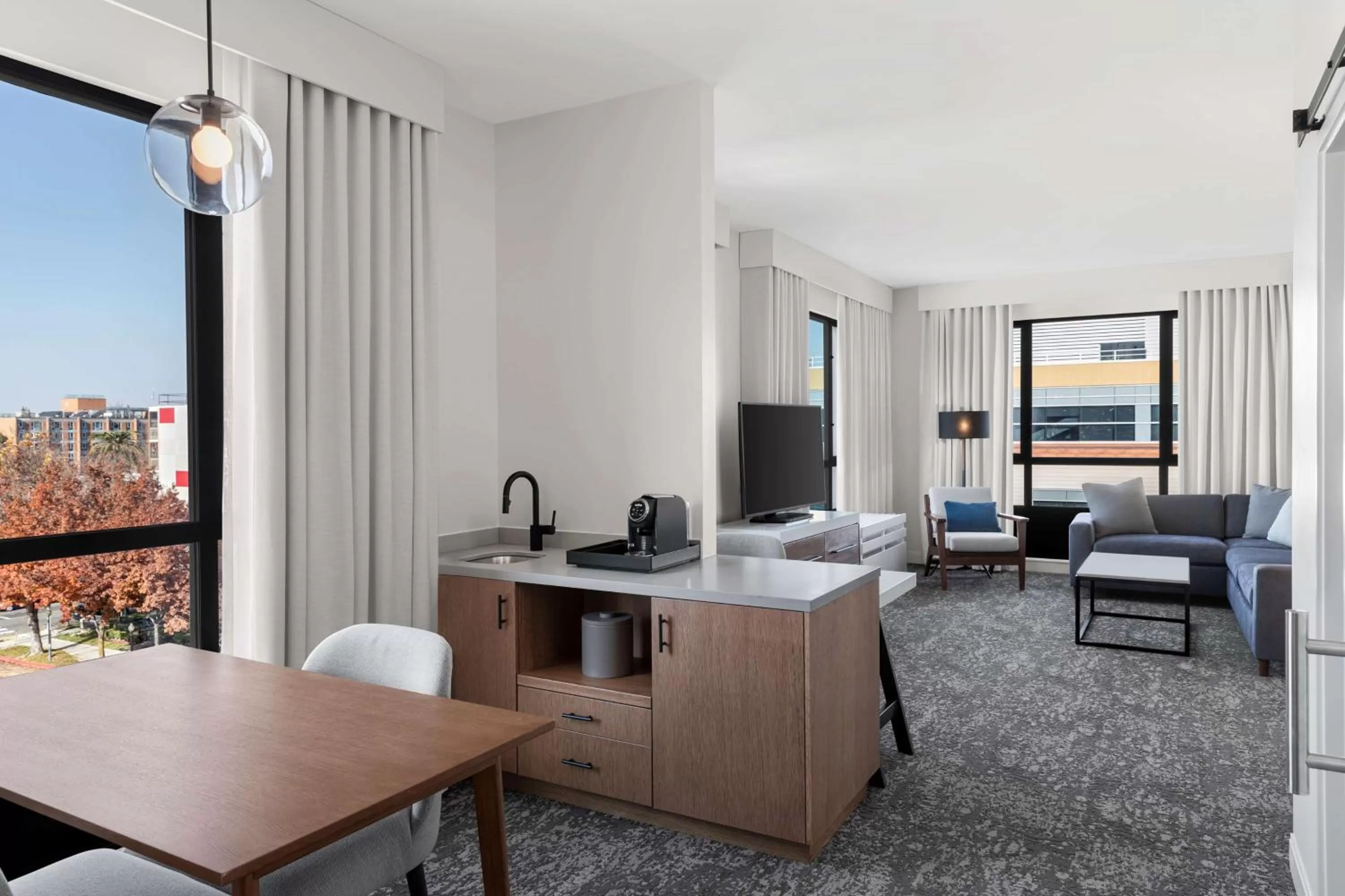 Living room in Tapestry By Hilton The Fort Sutter Hotel Sacramento, Ca