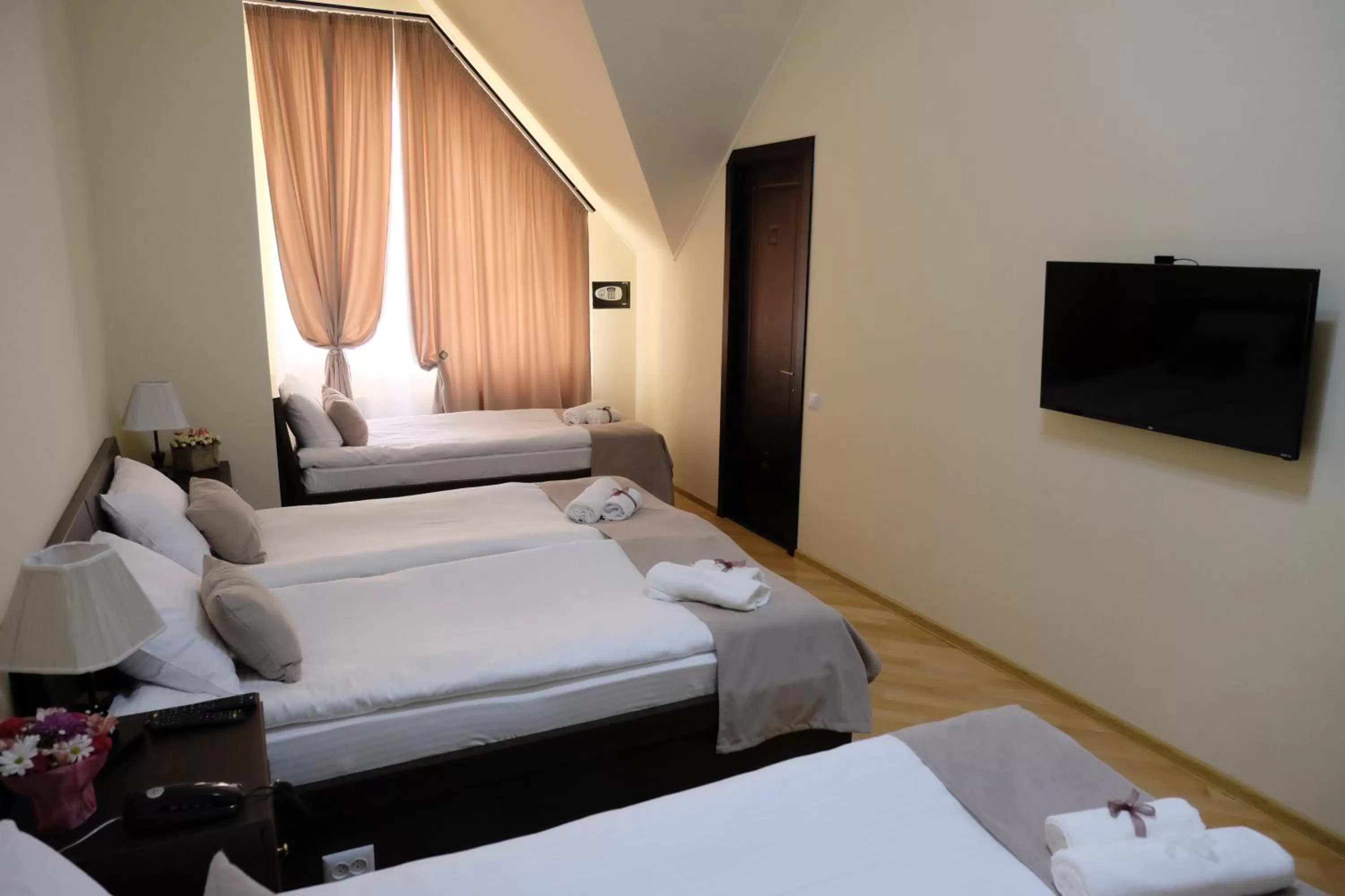 Photo of the whole room, Bed in S&L Boutique Hotel